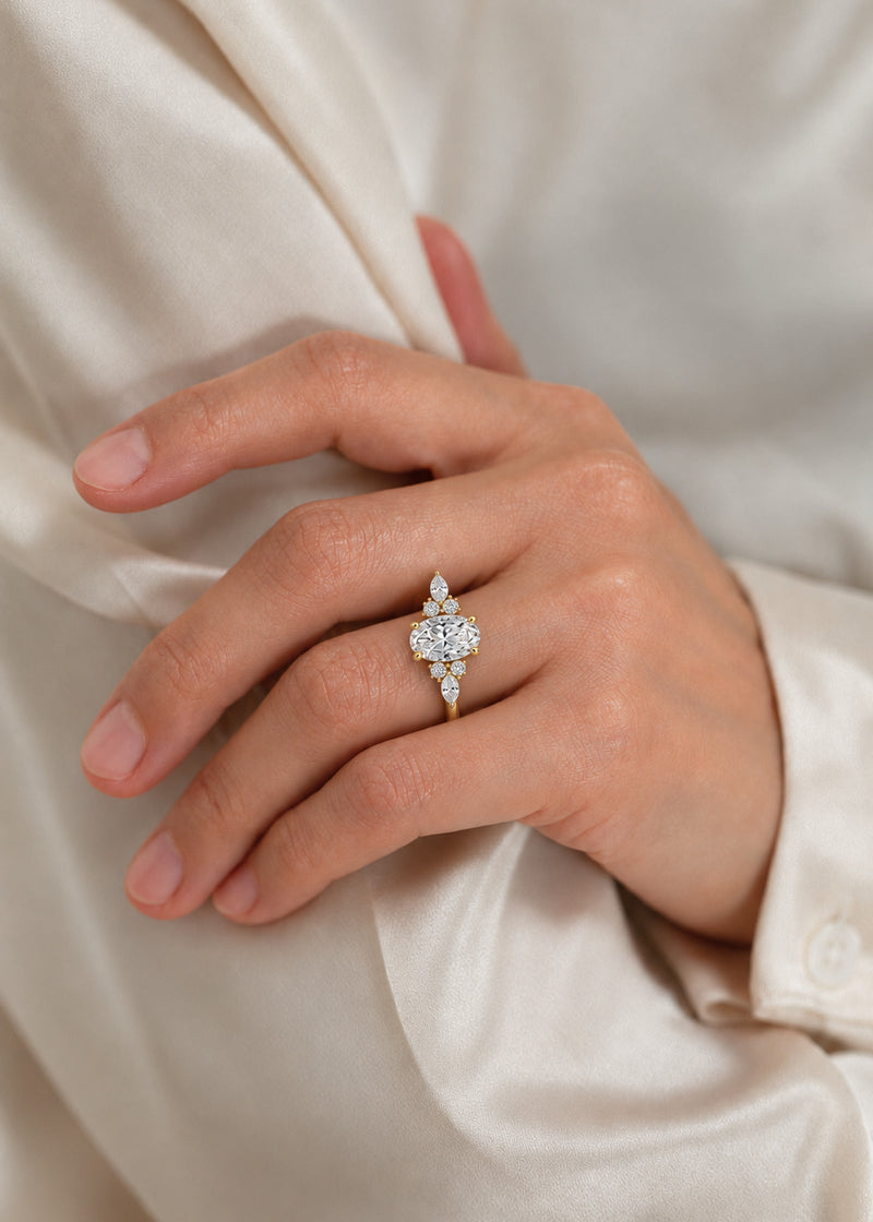 Oval lab-grown diamond engagement ring worn on the hand