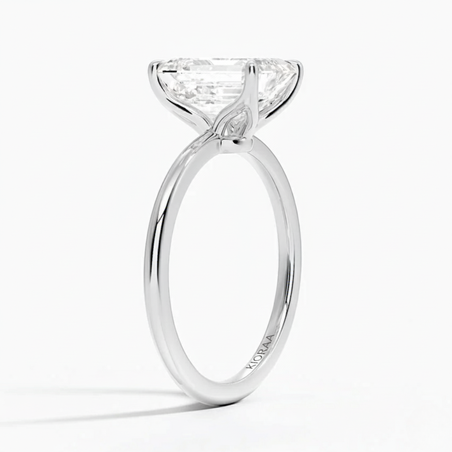 Classic Petal Emerald Solitaire Engagement Ring