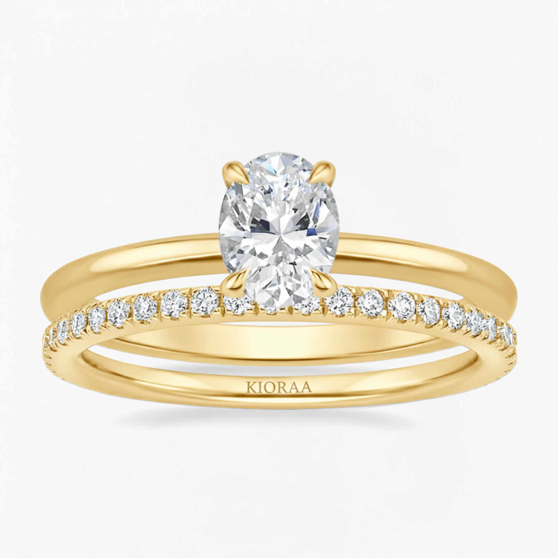 Classic Petal Oval Solitaire Ring with Simple Round Eternity Band