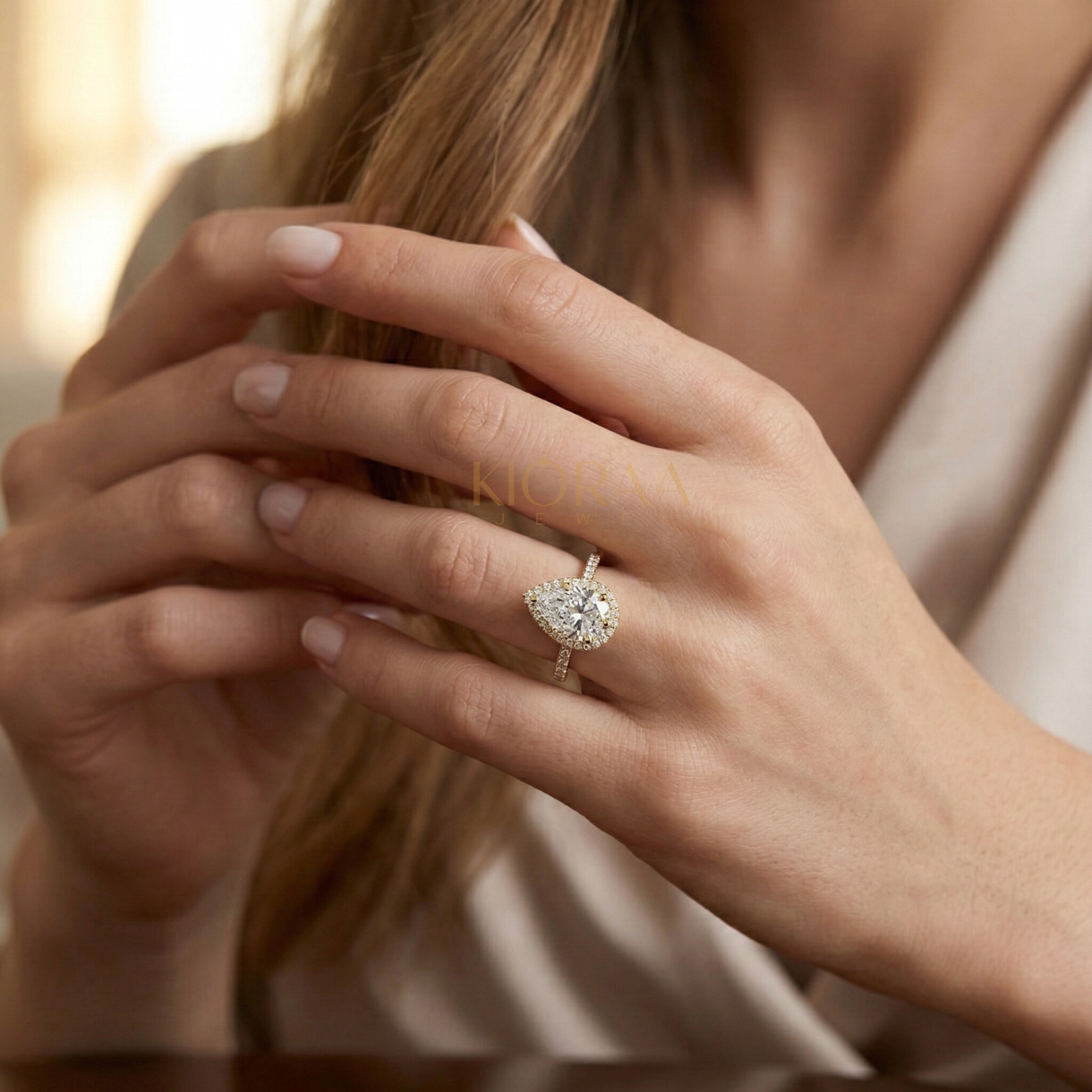 Classic Pear Diamond Halo Engagement Ring