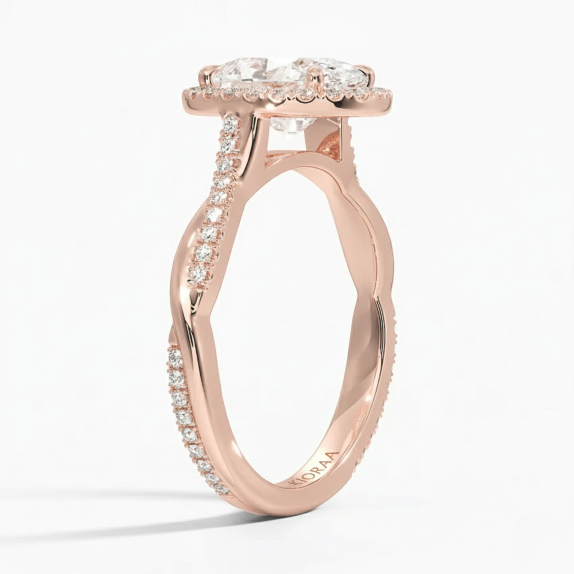 Classic Twist Oval Diamond Halo Engagement Ring