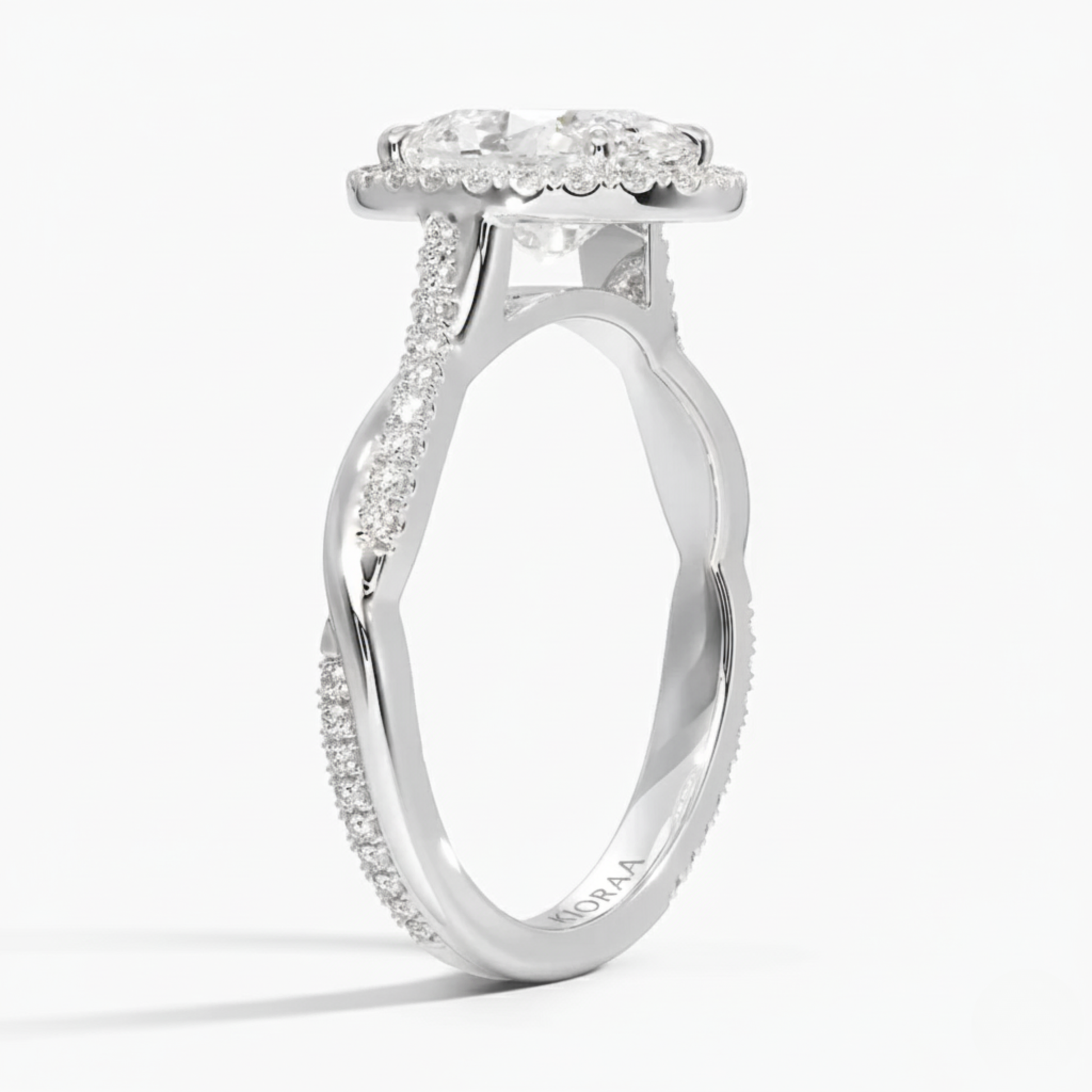 Classic Twist Oval Diamond Halo Engagement Ring
