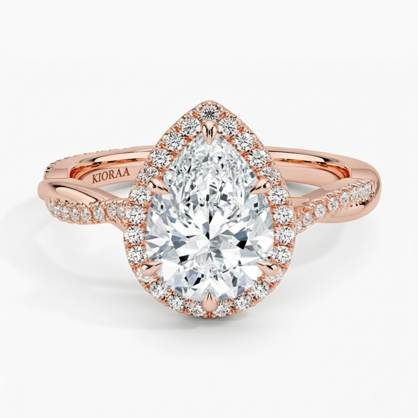 Classic Twist Pear Diamond Halo Engagement Ring