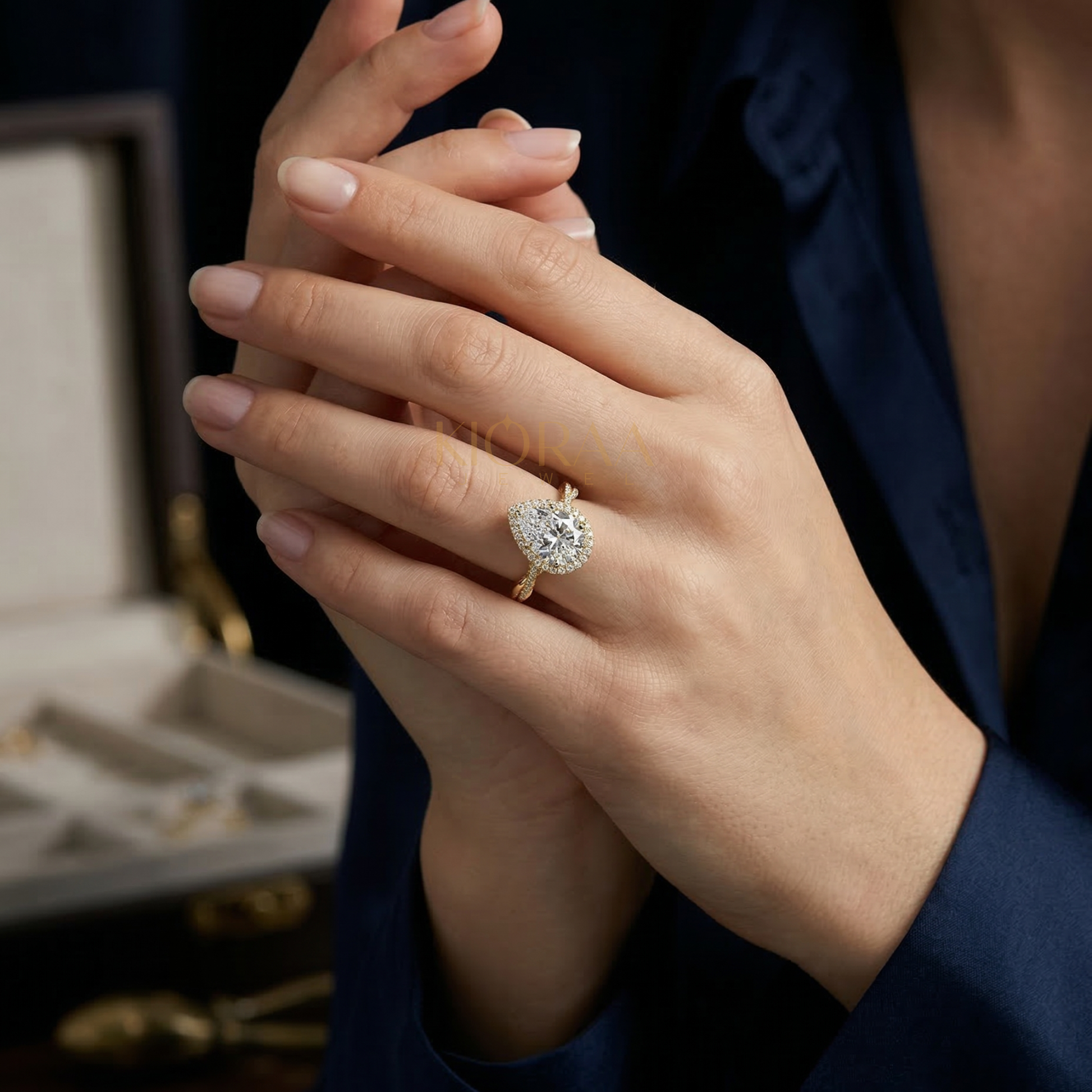 Classic Twist Pear Diamond Halo Engagement Ring