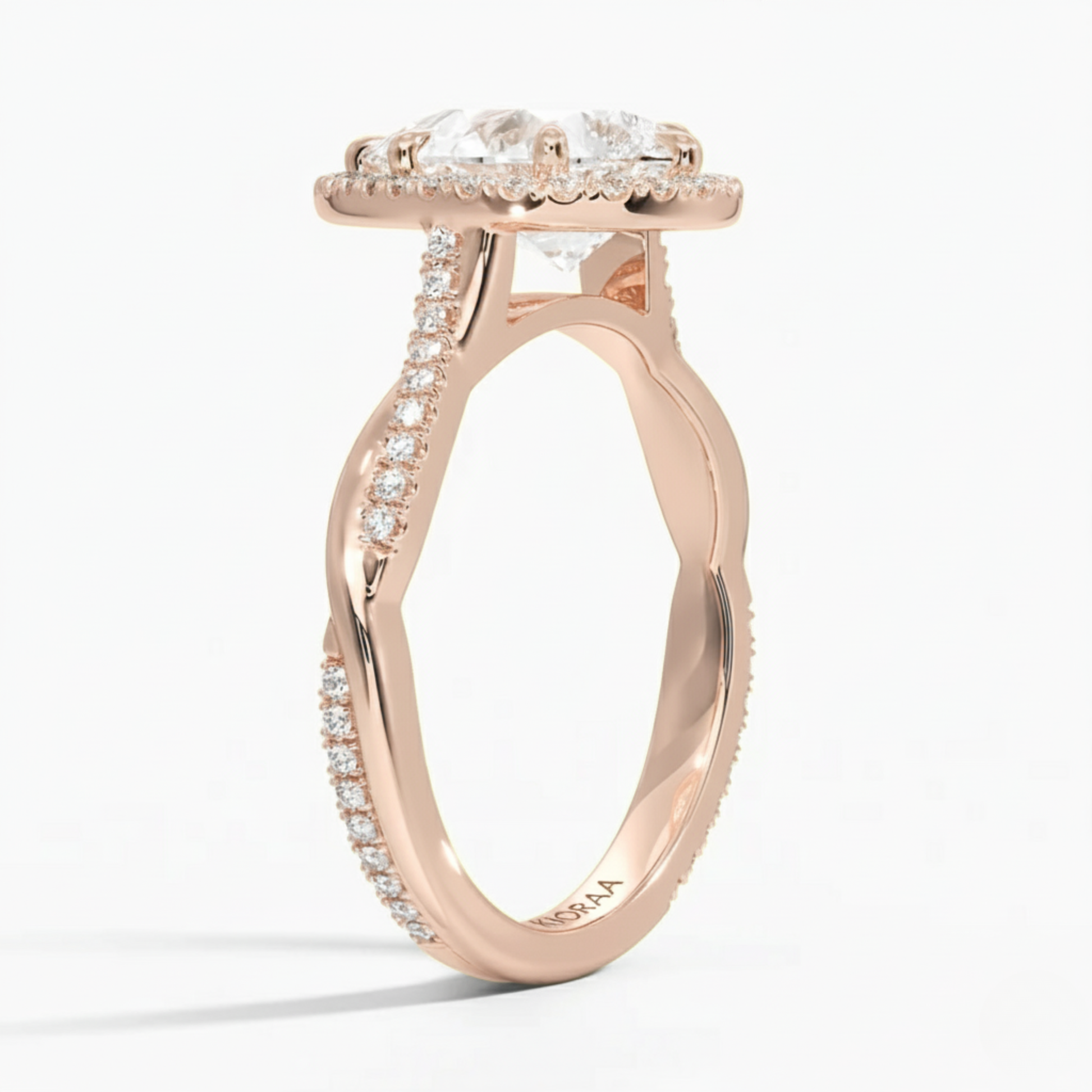 Classic Twist Pear Diamond Halo Engagement Ring