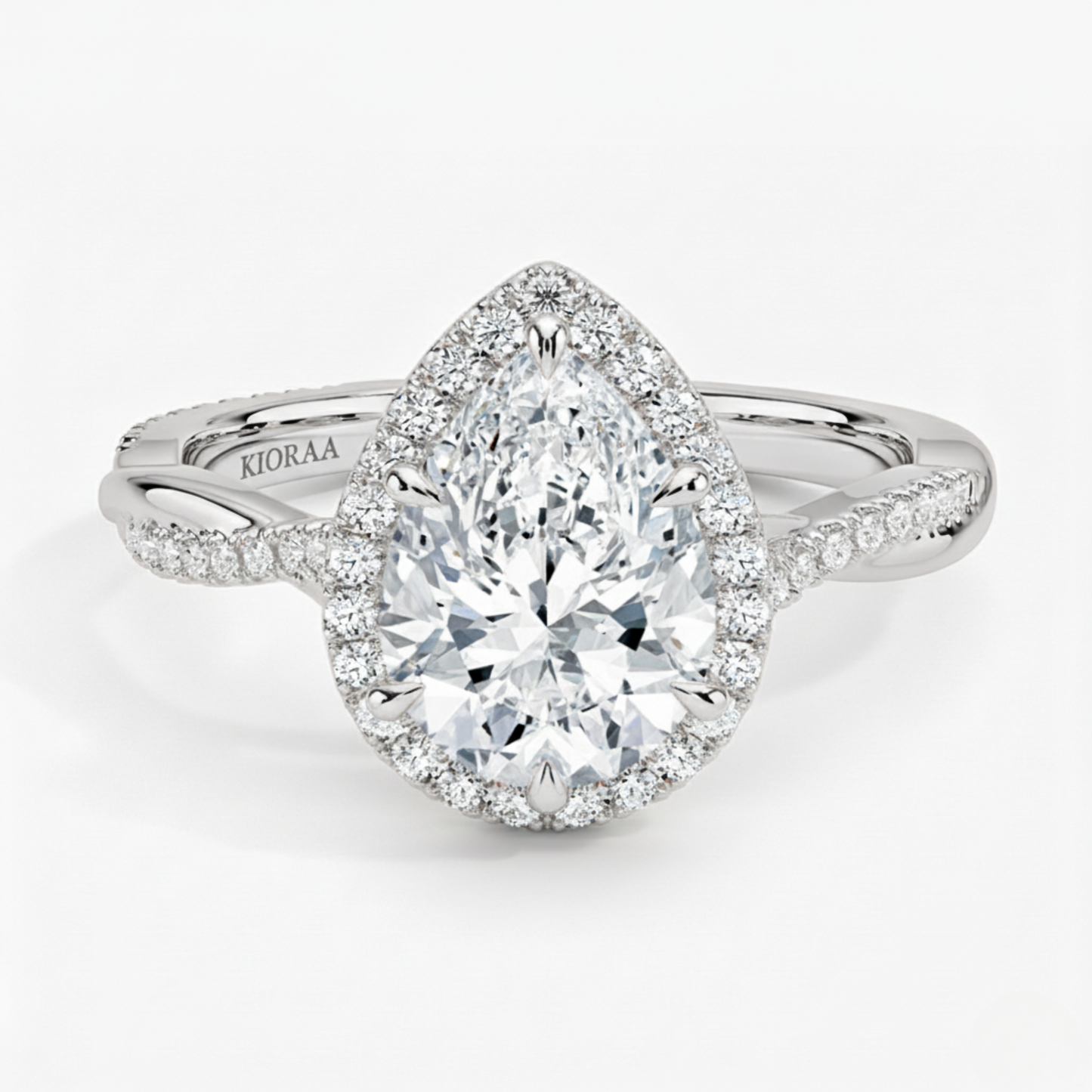Classic Twist Pear Diamond Halo Engagement Ring