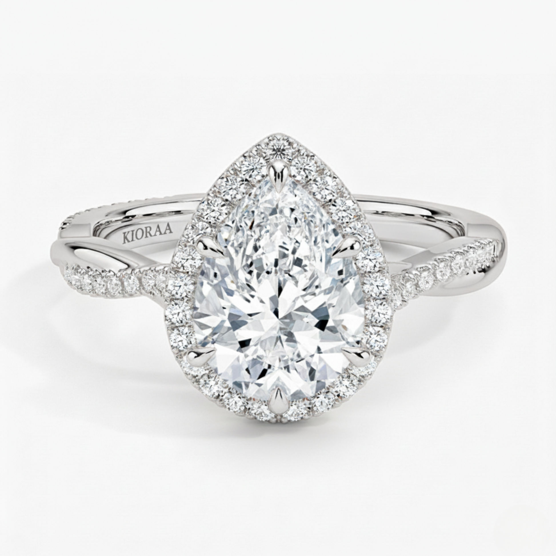 Classic Twist Pear Diamond Halo Engagement Ring