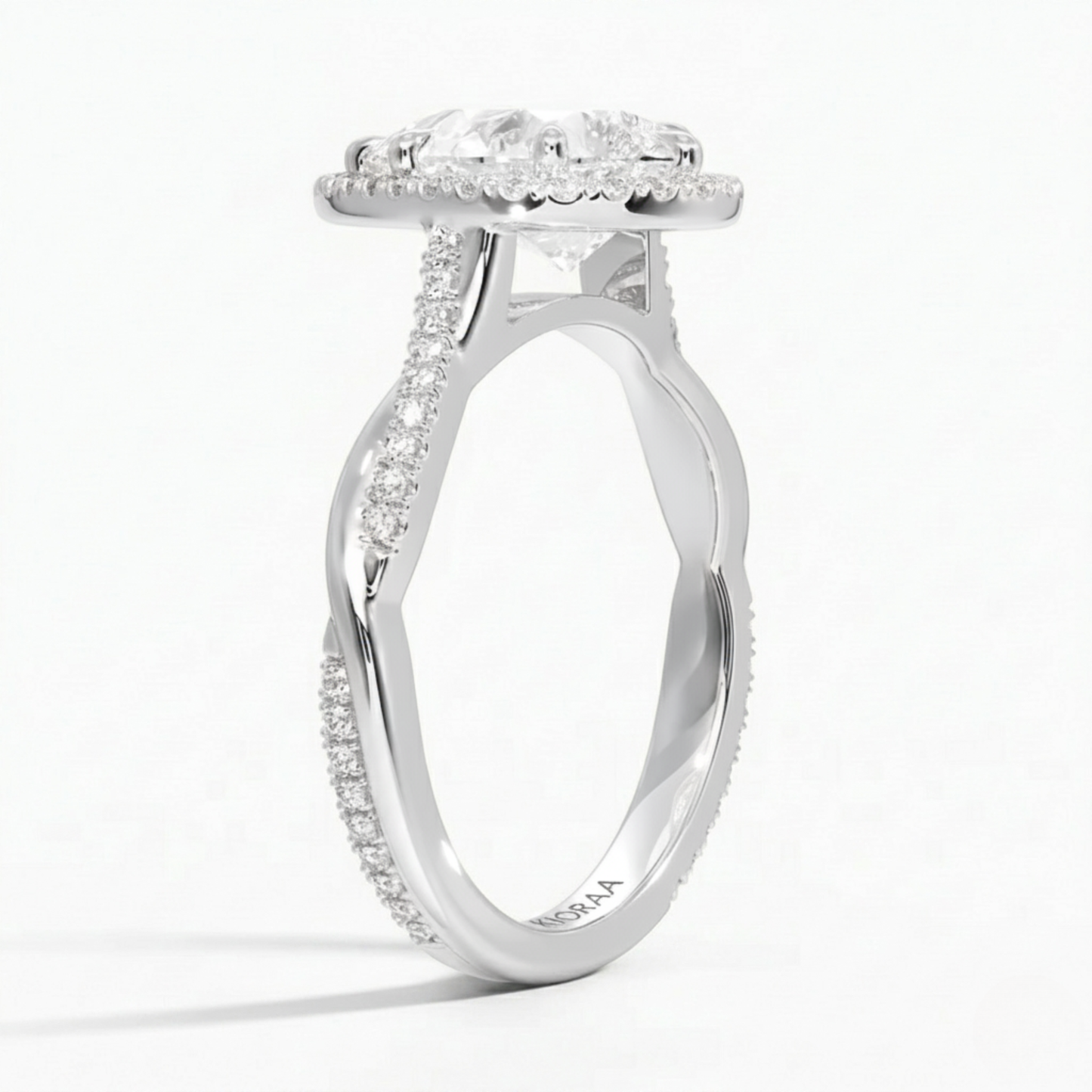 Classic Twist Pear Diamond Halo Engagement Ring