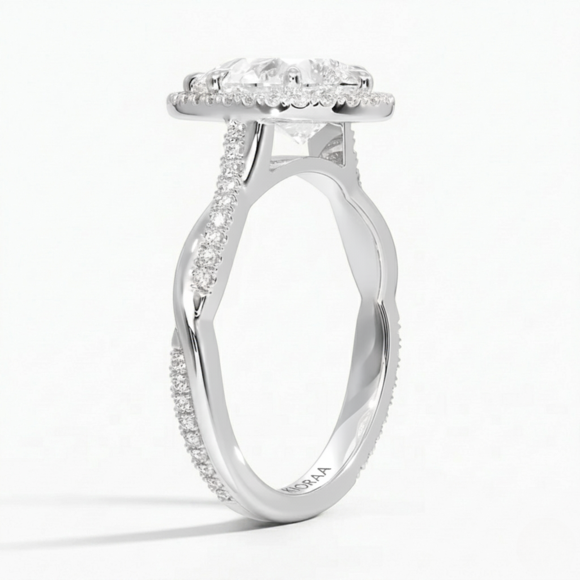 Classic Twist Pear Diamond Halo Engagement Ring