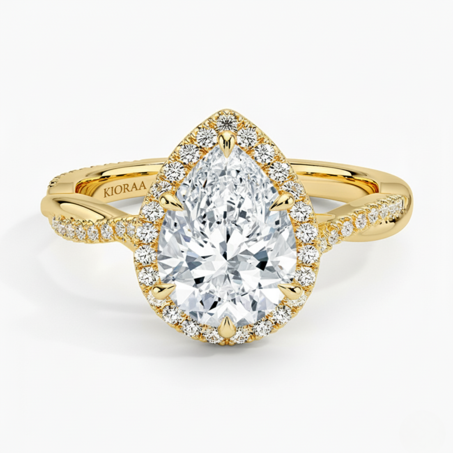 Classic Twist Pear Diamond Halo Engagement Ring