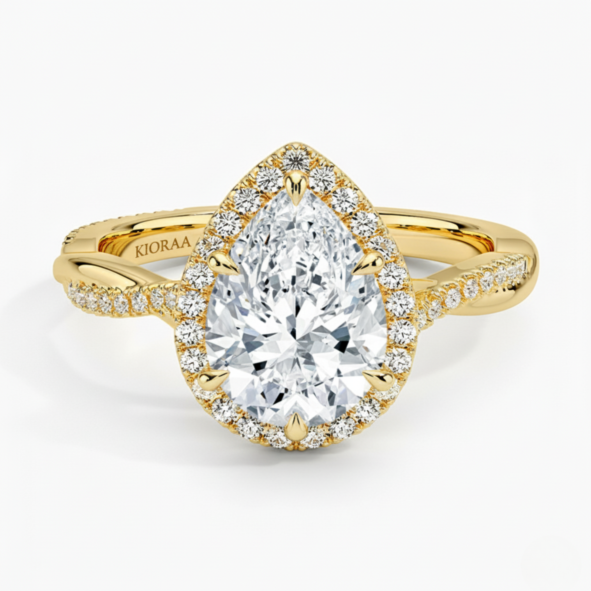 Classic Twist Pear Diamond Halo Engagement Ring