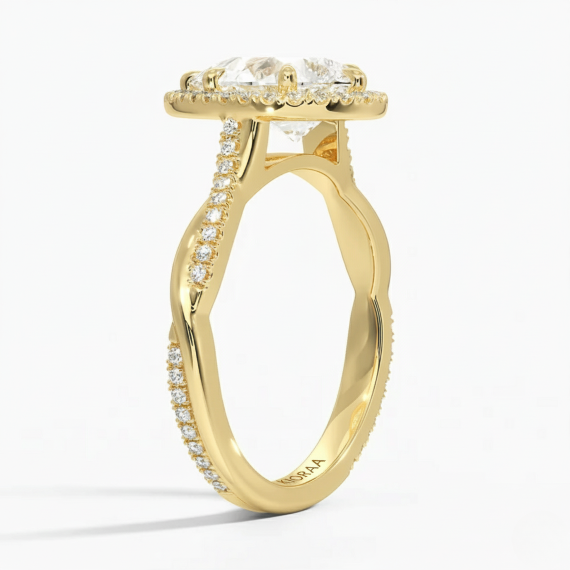 Classic Twist Pear Diamond Halo Engagement Ring