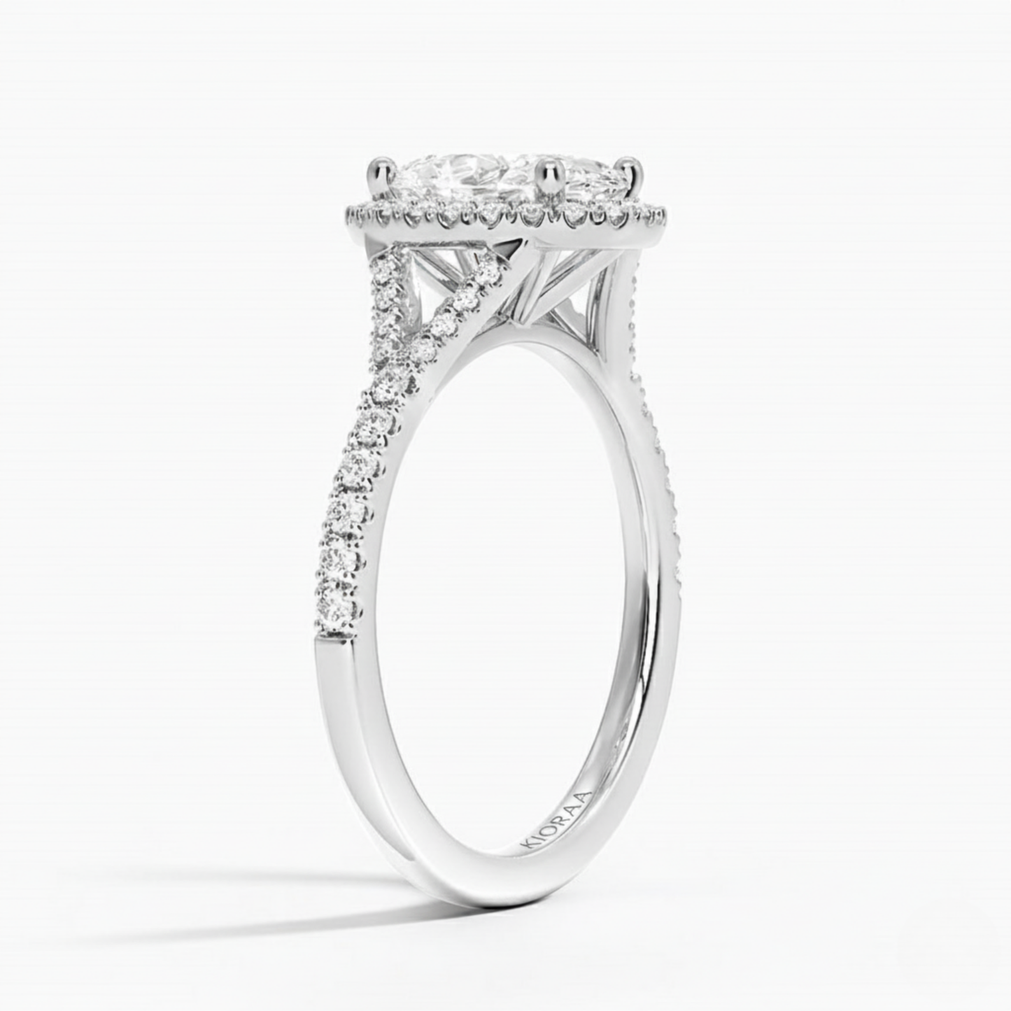 Half Coverage Oval Diamond Halo Engagement Ring