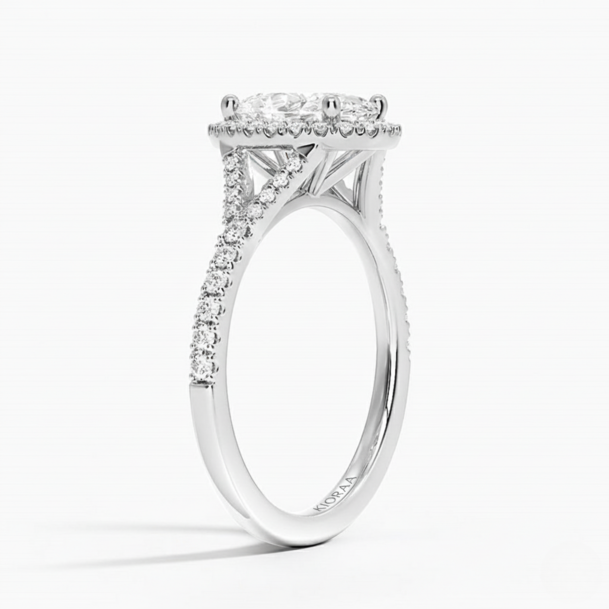 Half Coverage Oval Diamond Halo Engagement Ring
