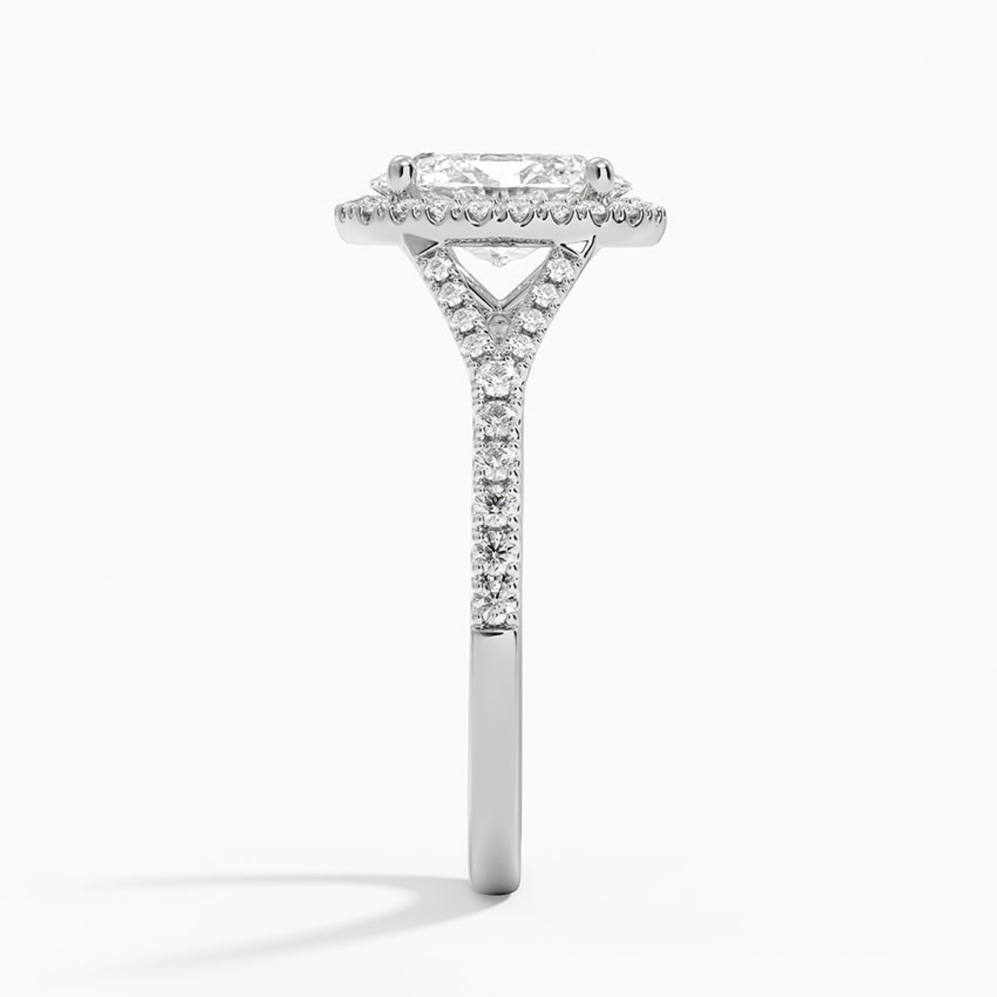 Half Coverage Oval Diamond Halo Engagement Ring