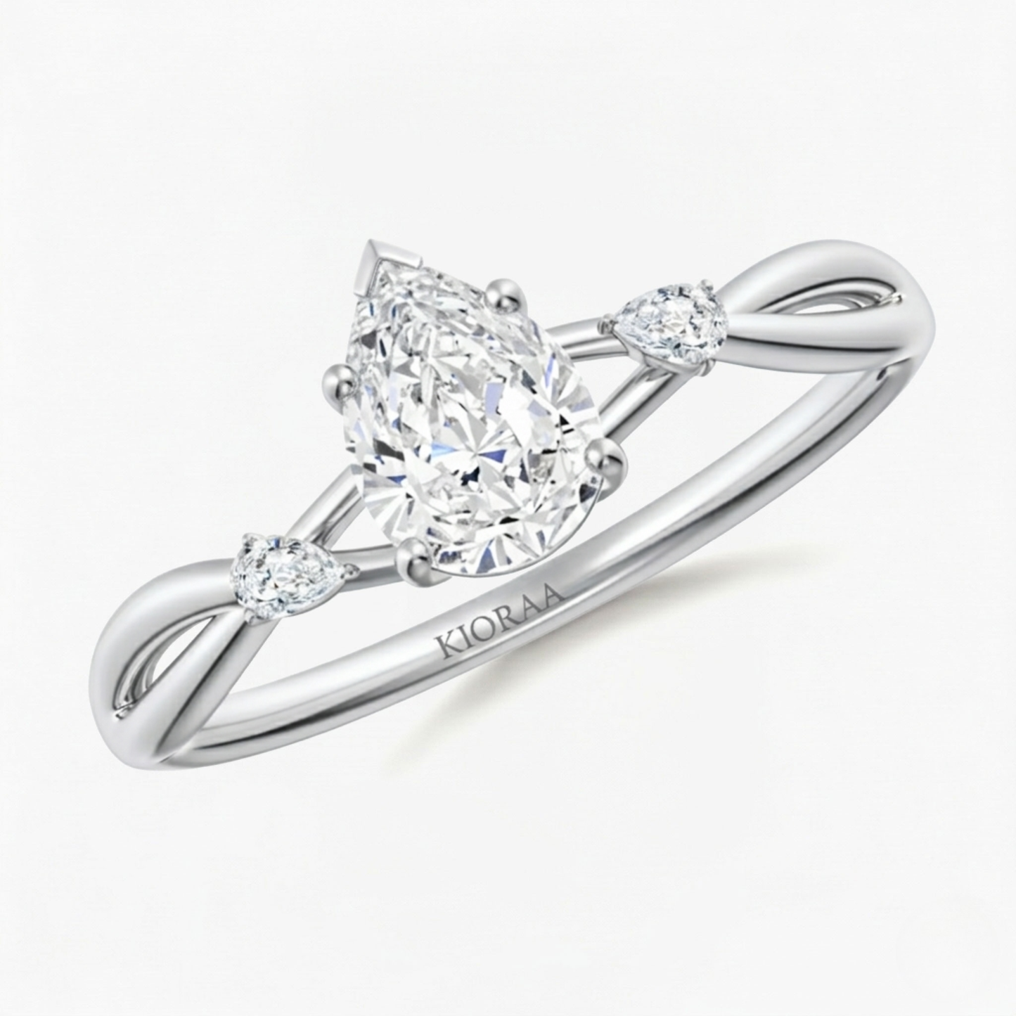 Pear Shape Three Stone Diamond Ring