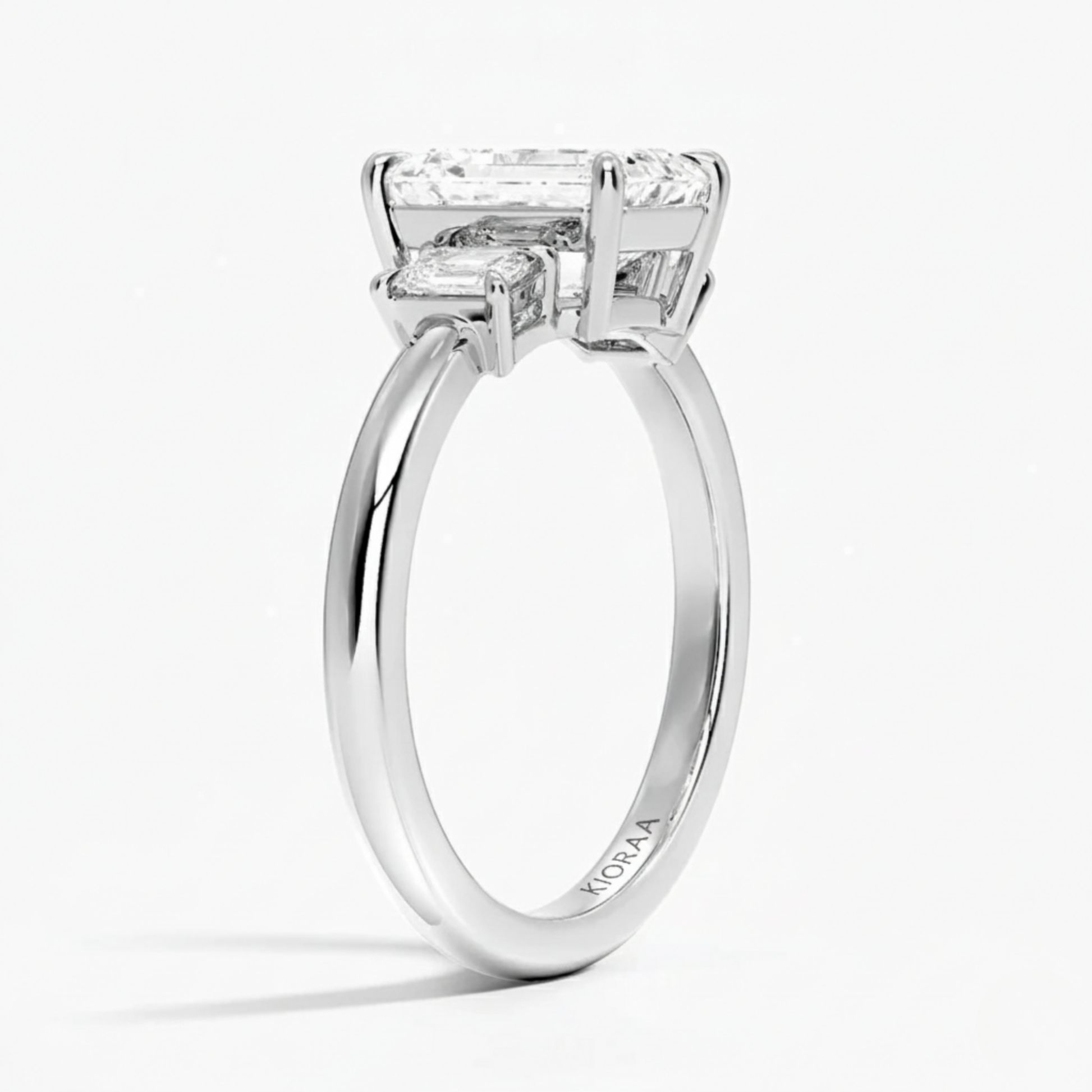 Emerald Three Stone Engagement Ring