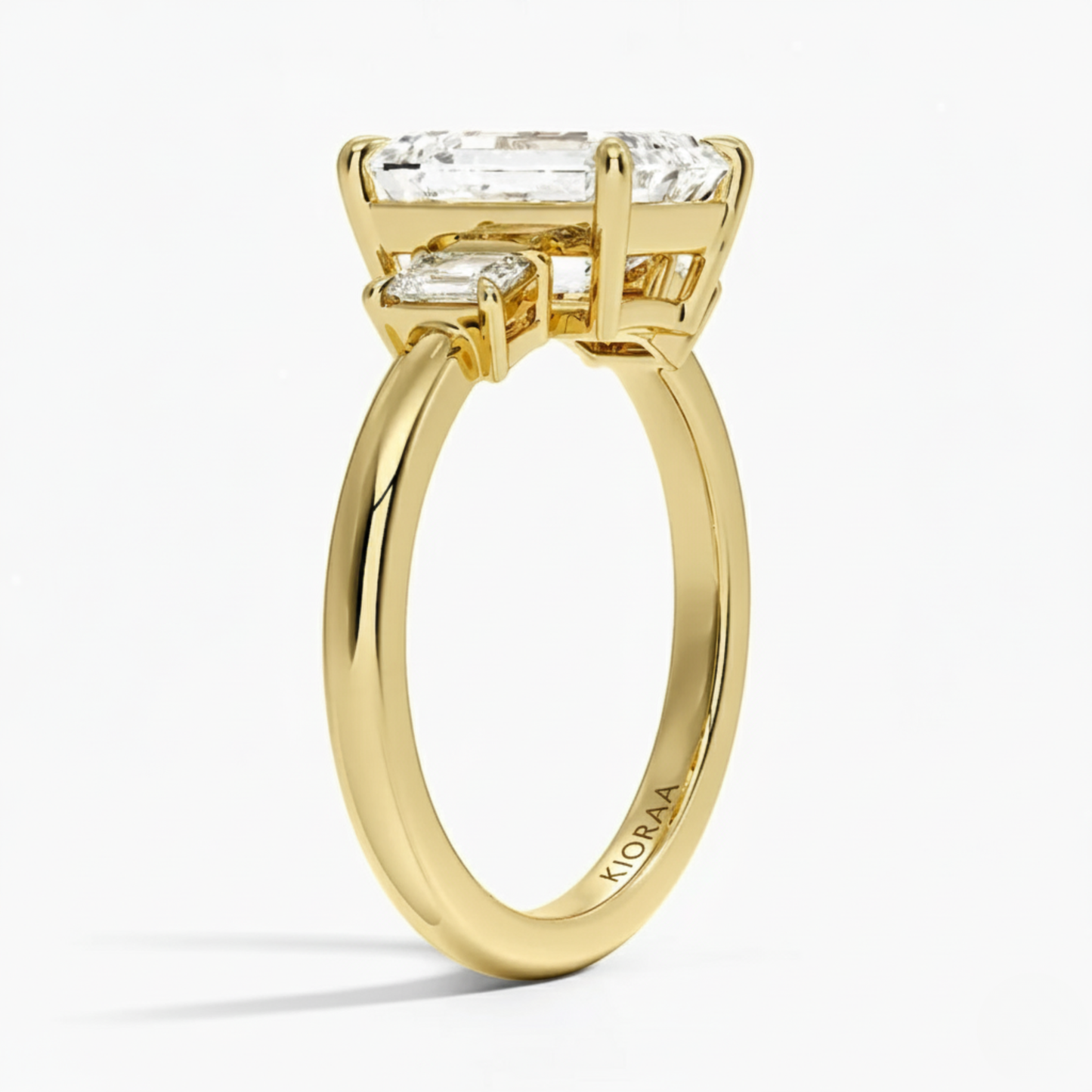 Emerald Three Stone Engagement Ring