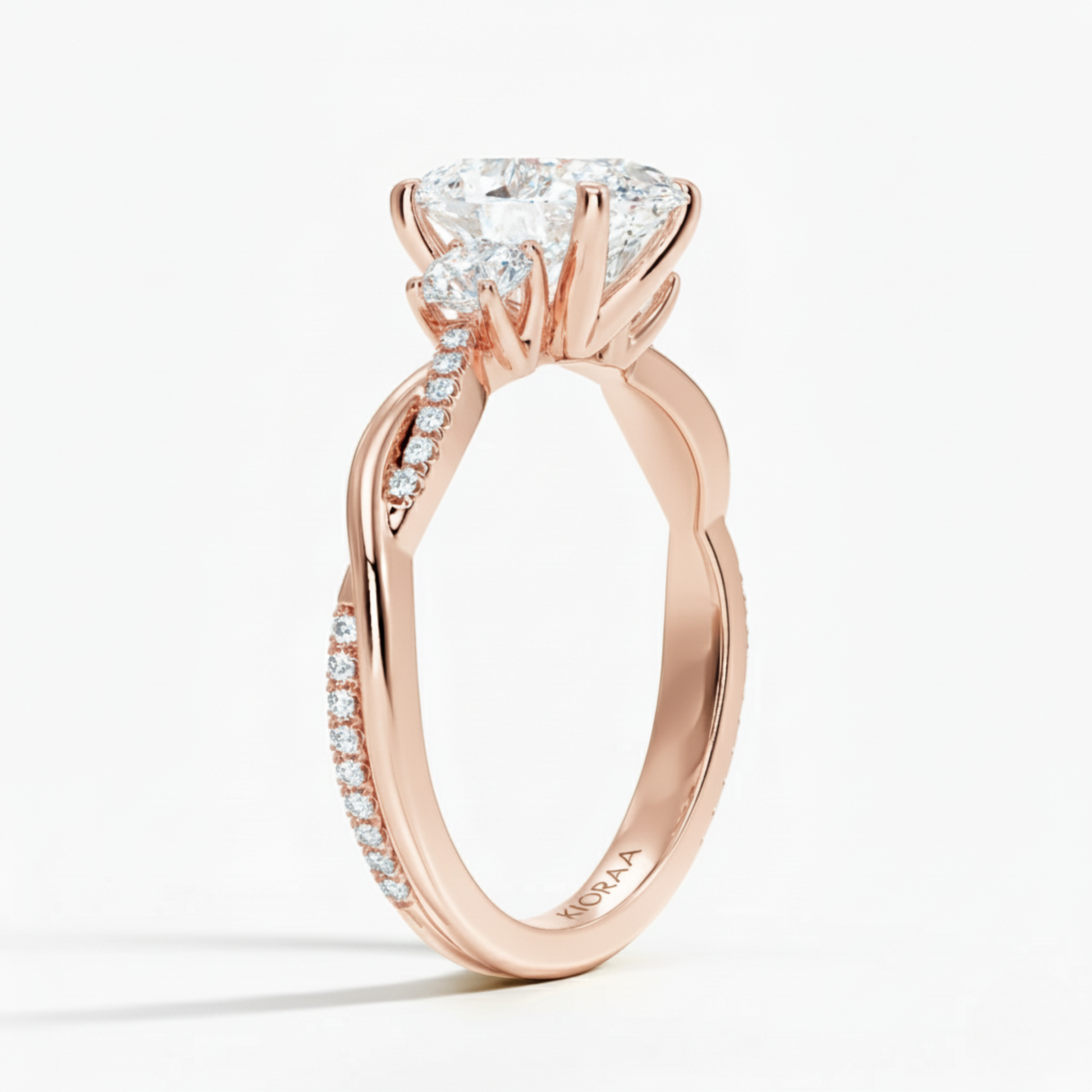 Twist Oval Diamond Three Stone Engagement Ring