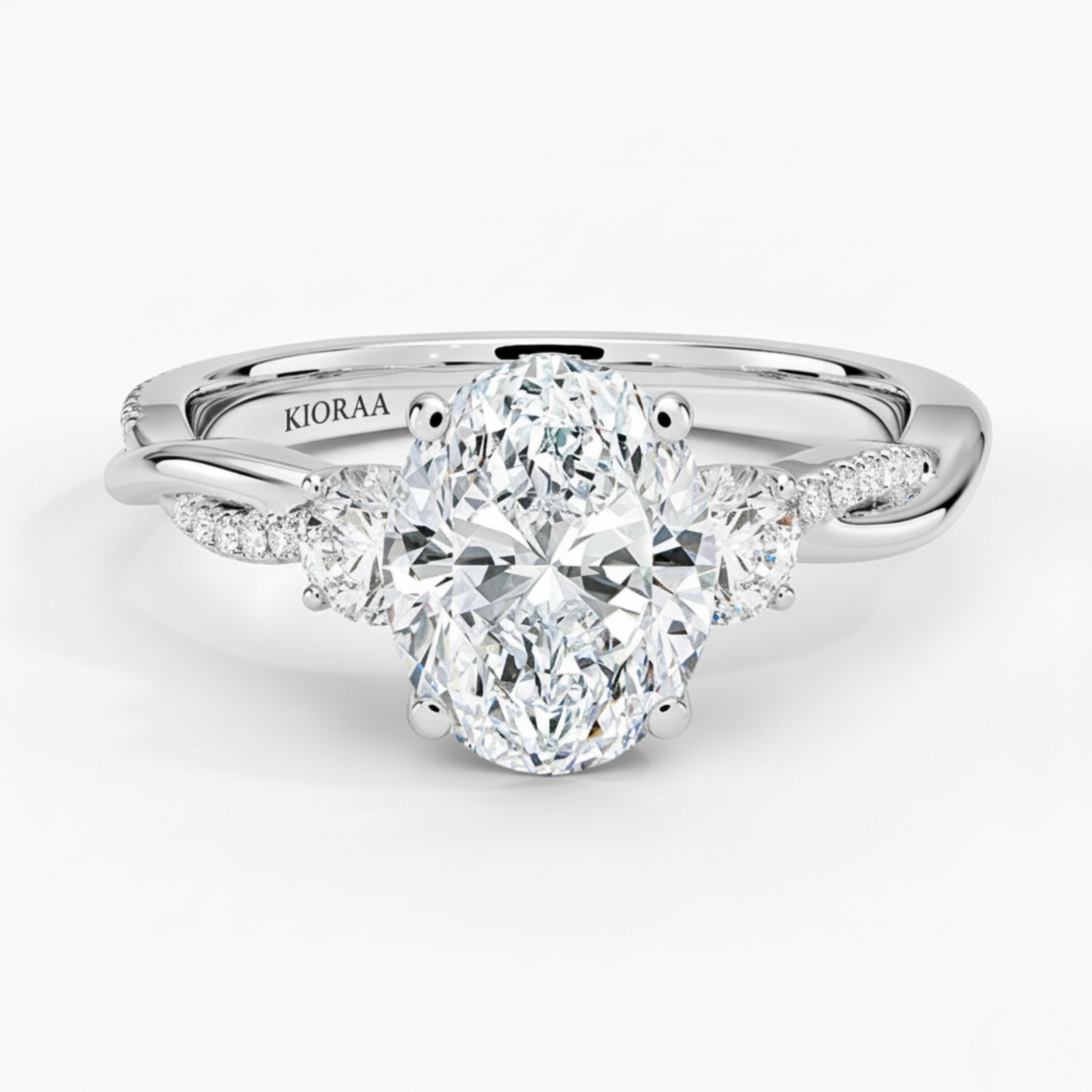 Twist Oval Diamond Three Stone Engagement Ring