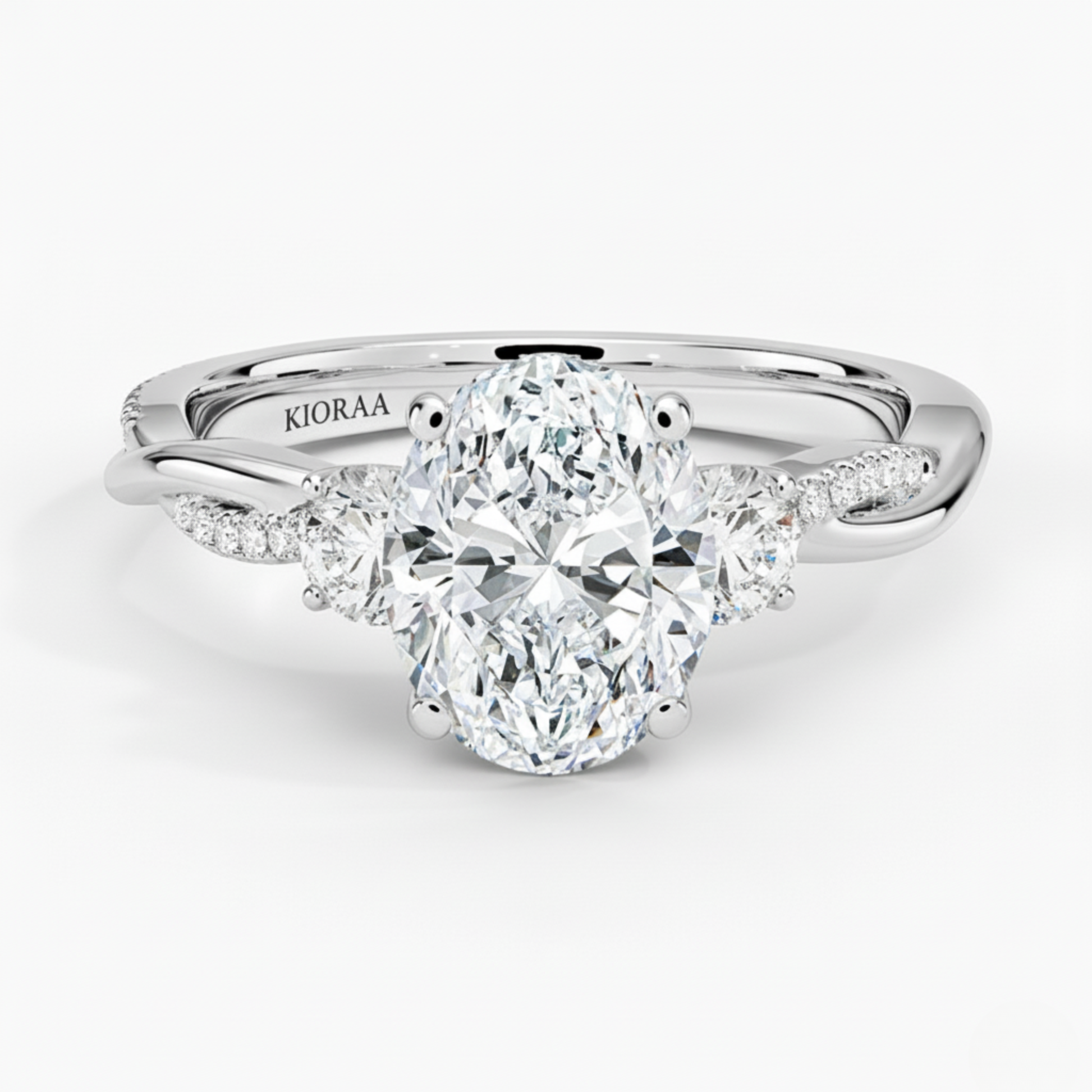 Twist Oval Diamond Three Stone Engagement Ring