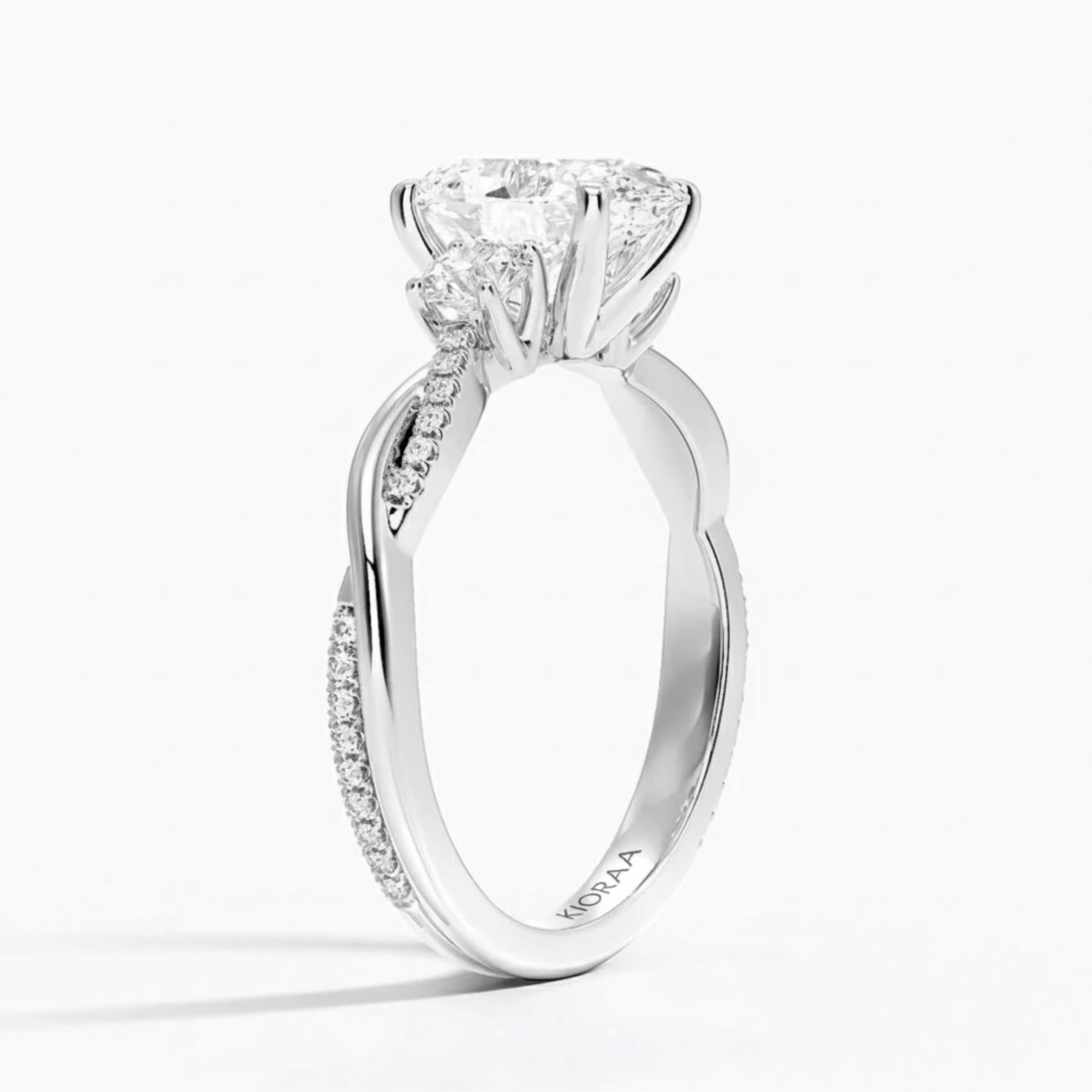 Twist Oval Diamond Three Stone Engagement Ring
