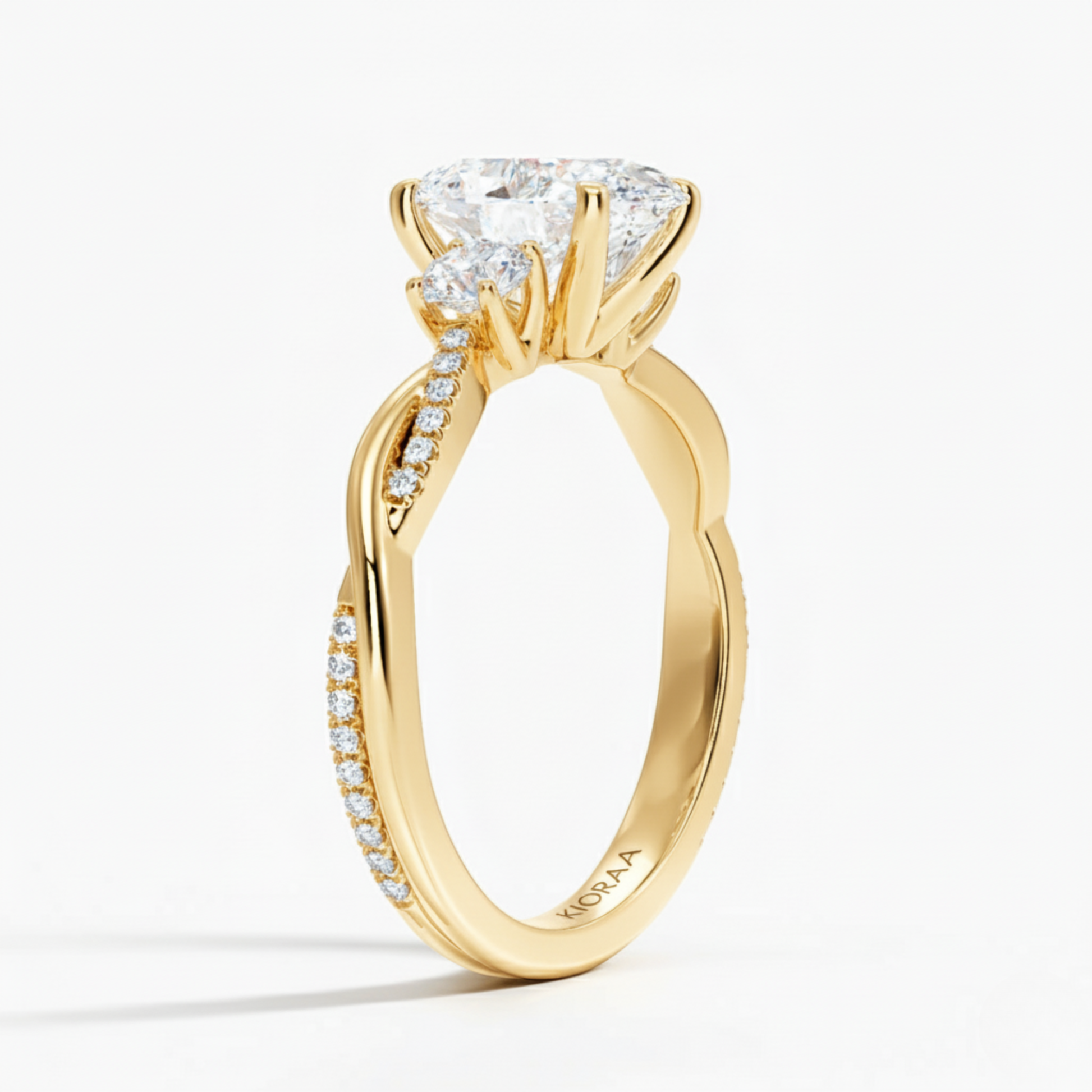 Twist Oval Diamond Three Stone Engagement Ring