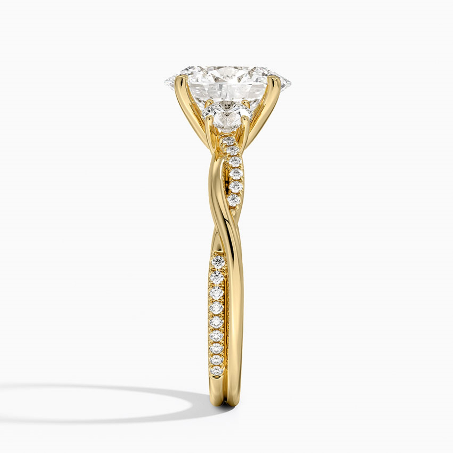 Twist Oval Diamond Three Stone Engagement Ring