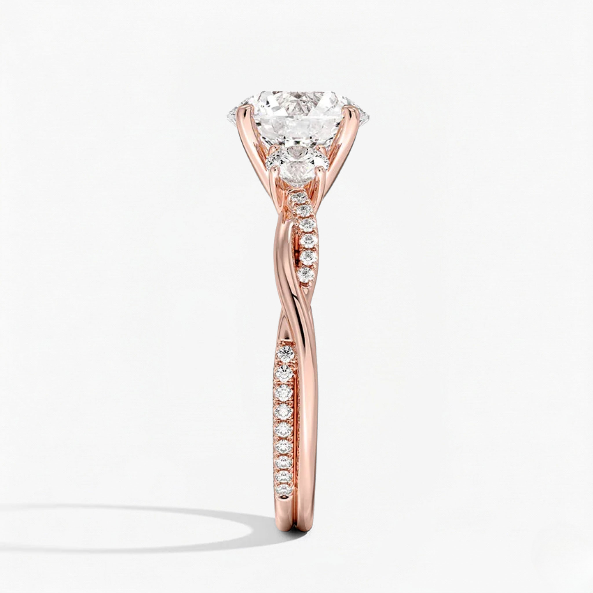 Twist Round Diamond Three Stone Engagement Ring