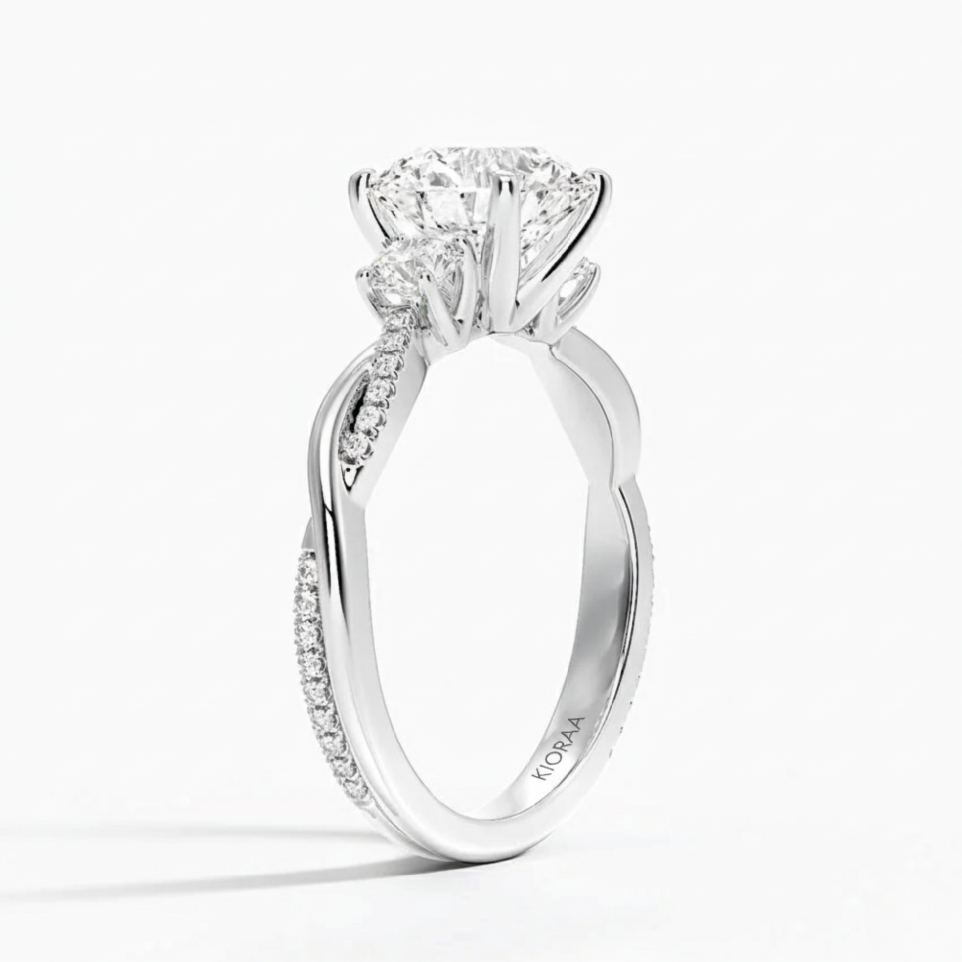 Twist Round Diamond Three Stone Engagement Ring