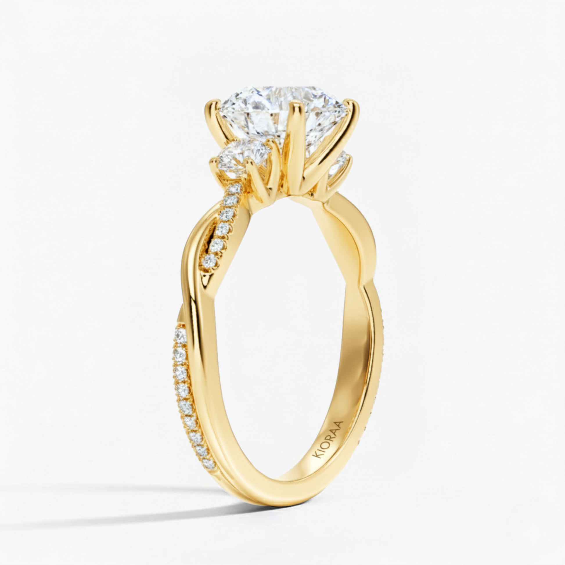 Twist Round Diamond Three Stone Engagement Ring