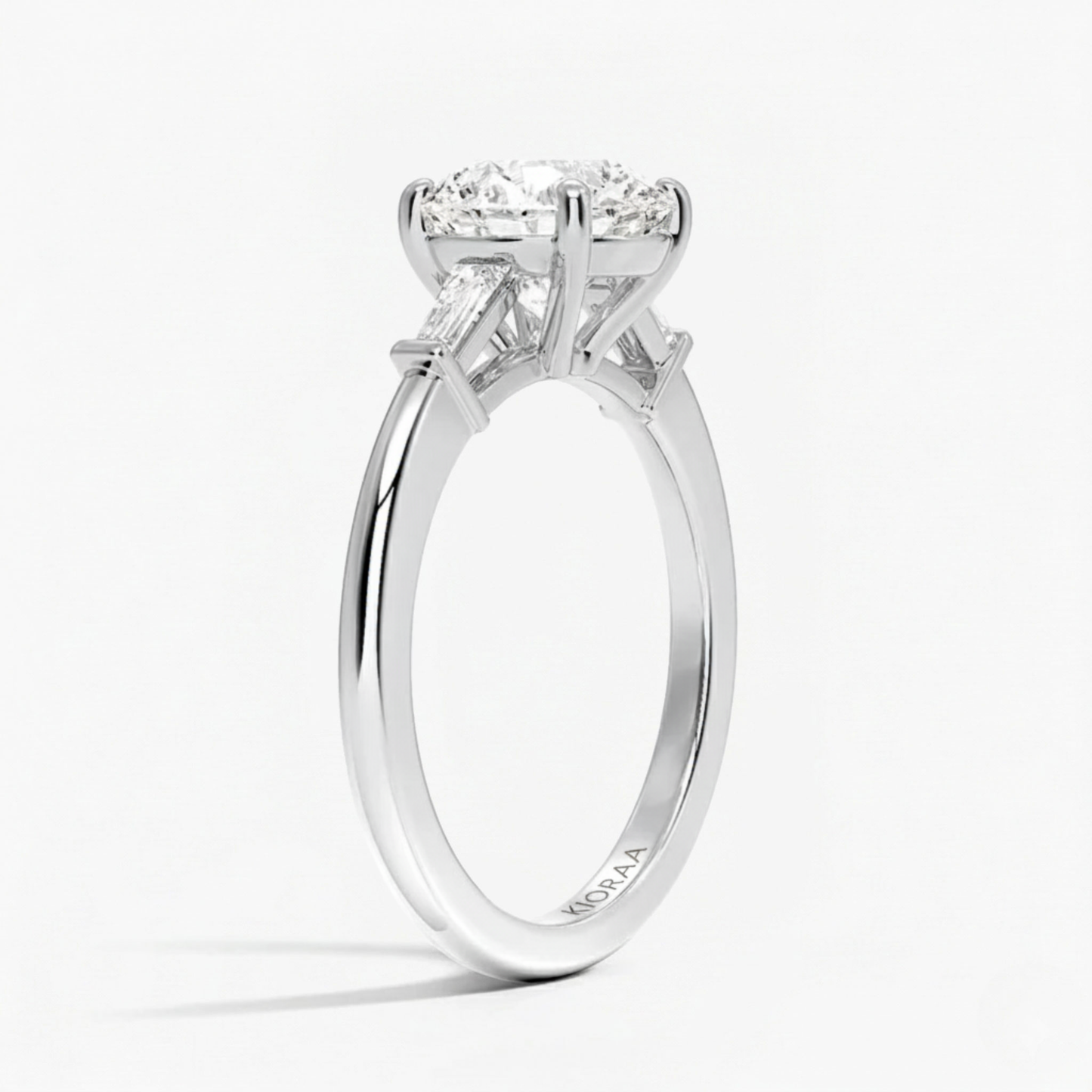 Round Shape Tapered Baguette Three Stone Engagement Ring