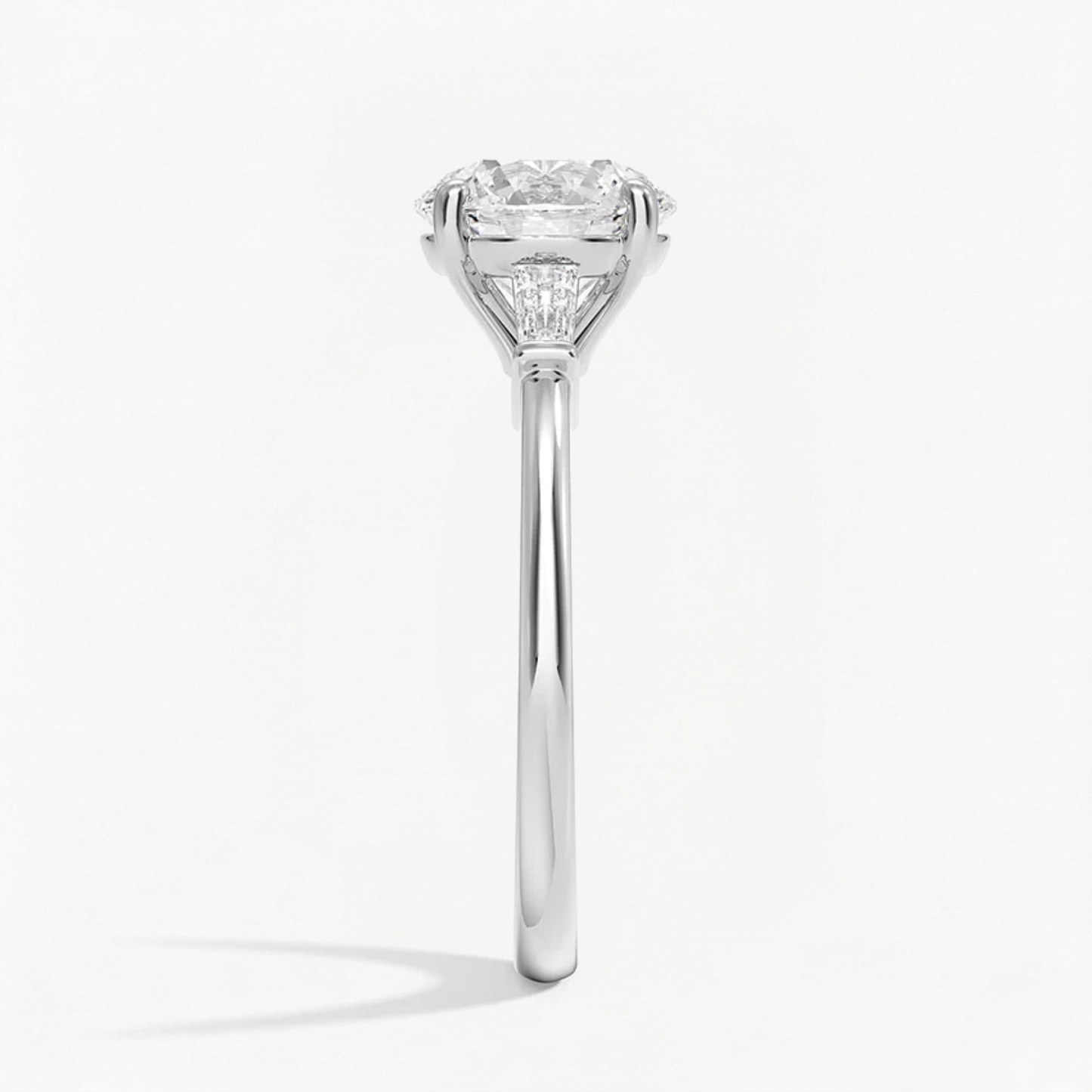 Round Shape Tapered Baguette Three Stone Engagement Ring