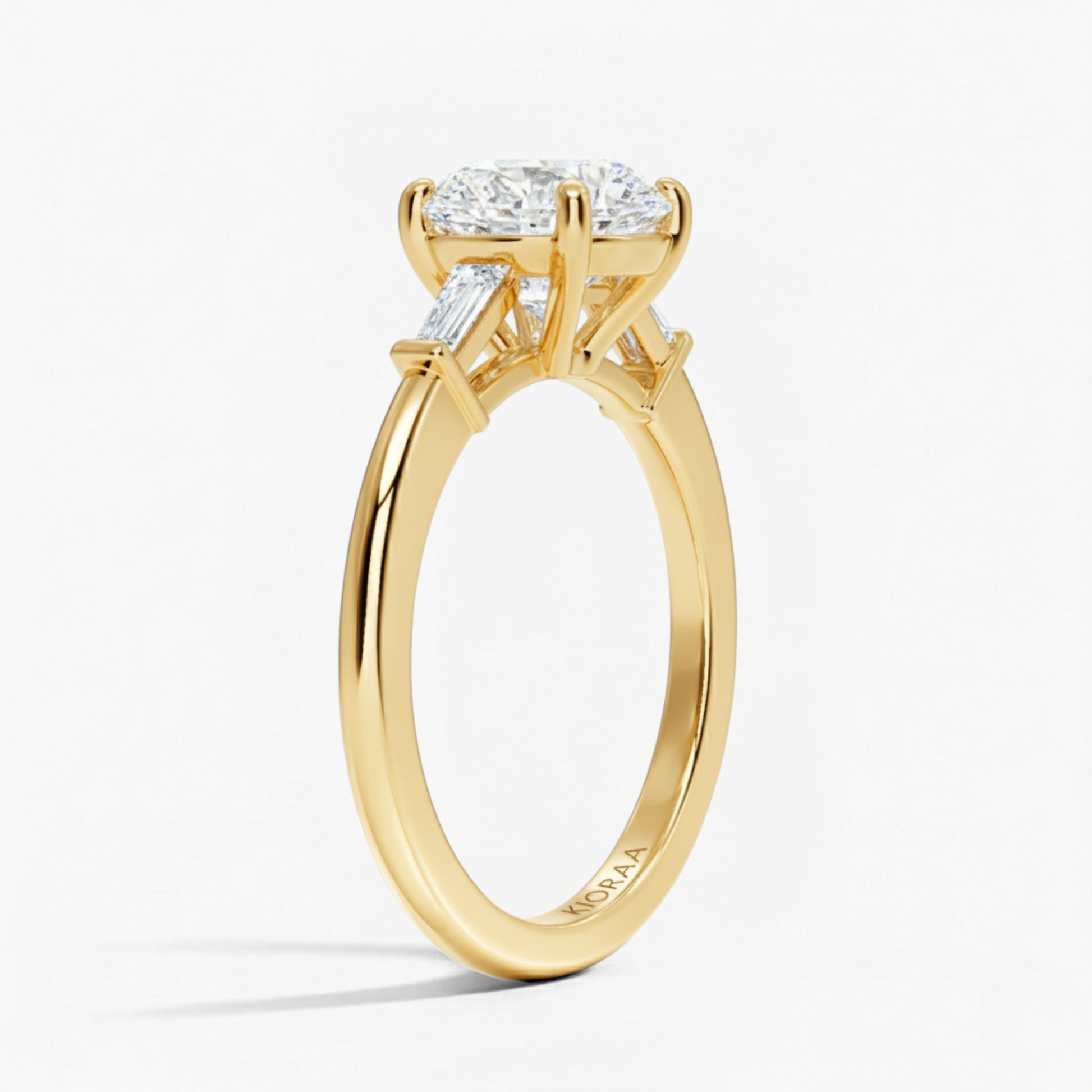 Round Shape Tapered Baguette Three Stone Engagement Ring
