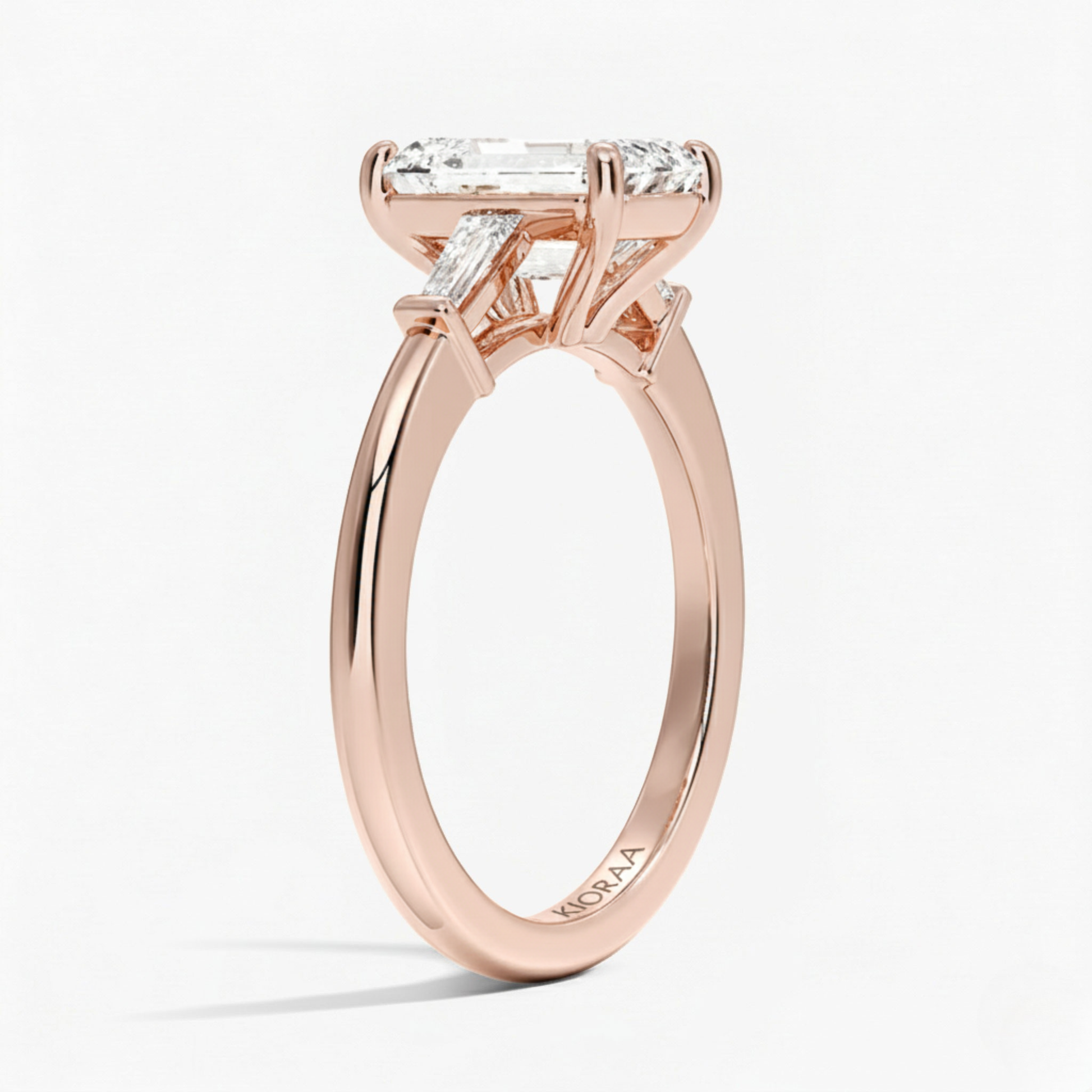 Emerald Shape Tapered Baguette Three Stone Engagement Ring