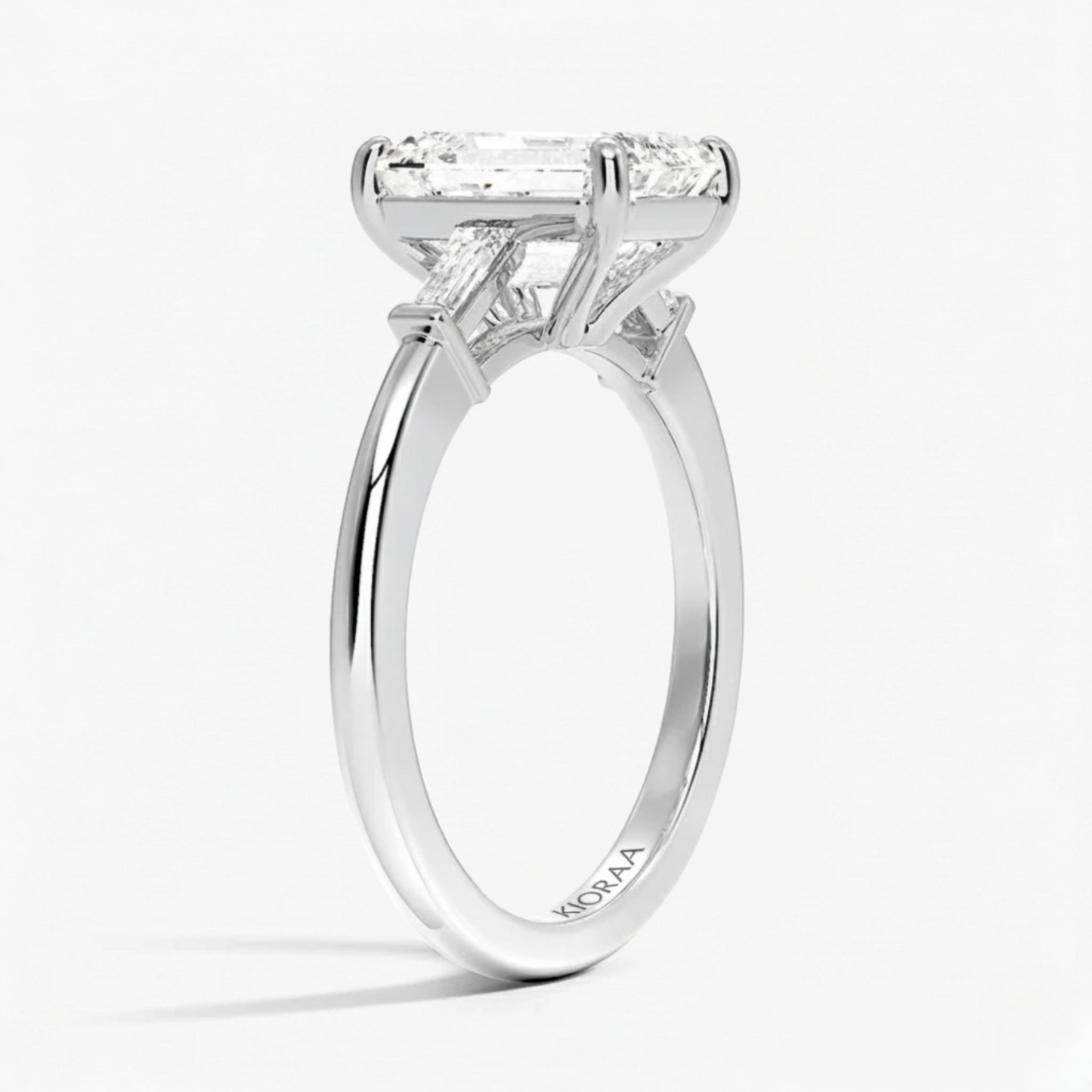 Emerald Shape Tapered Baguette Three Stone Engagement Ring
