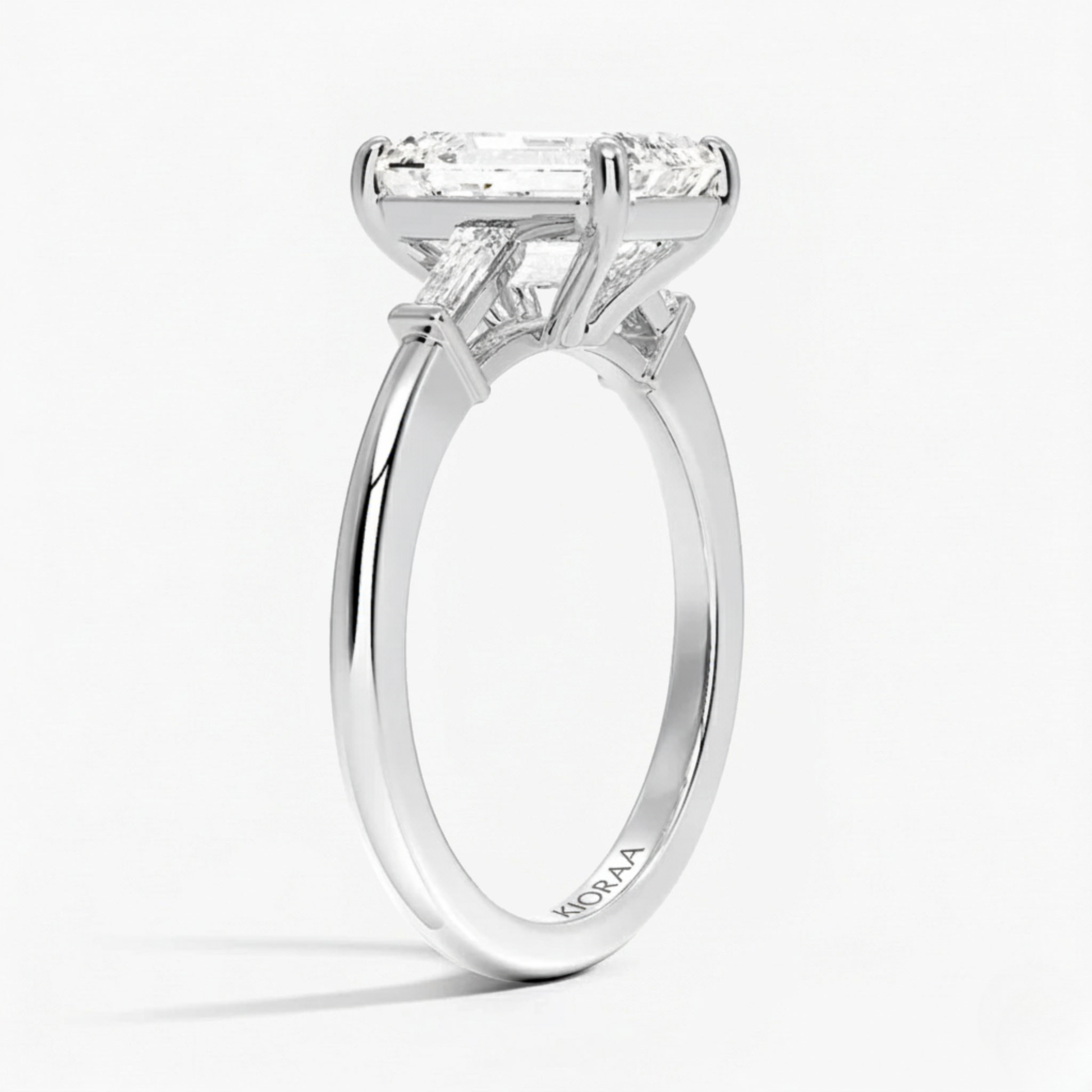Emerald Shape Tapered Baguette Three Stone Engagement Ring