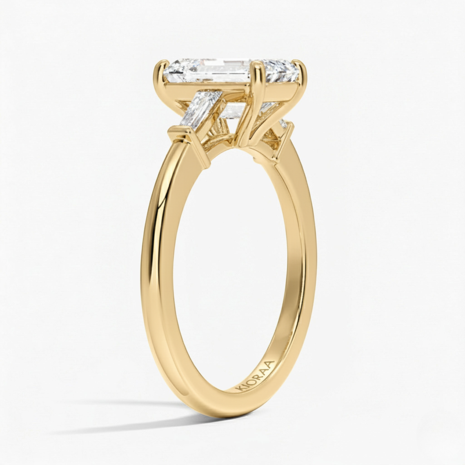 Emerald Shape Tapered Baguette Three Stone Engagement Ring