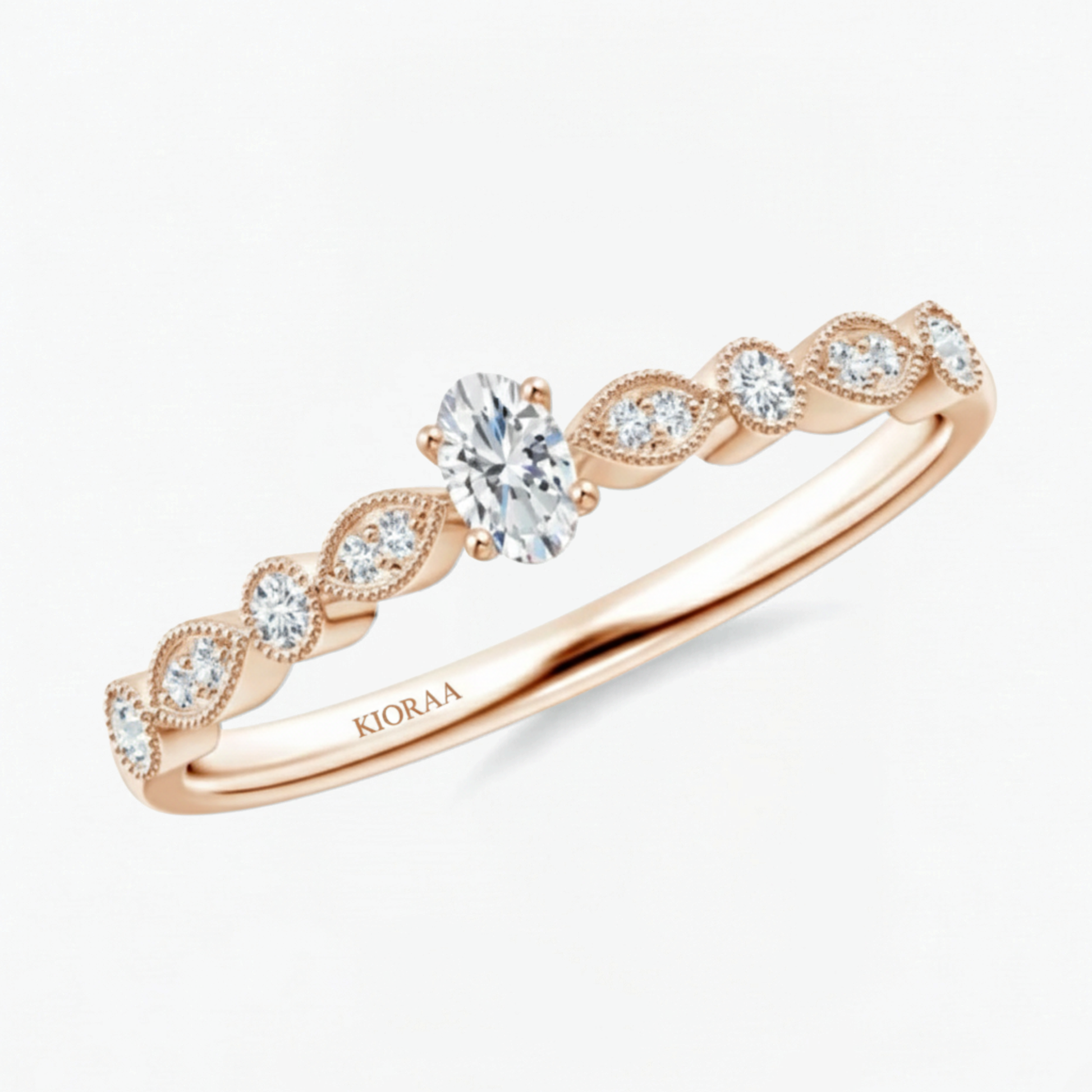 Vintage Halo Oval and Round Engagement Ring