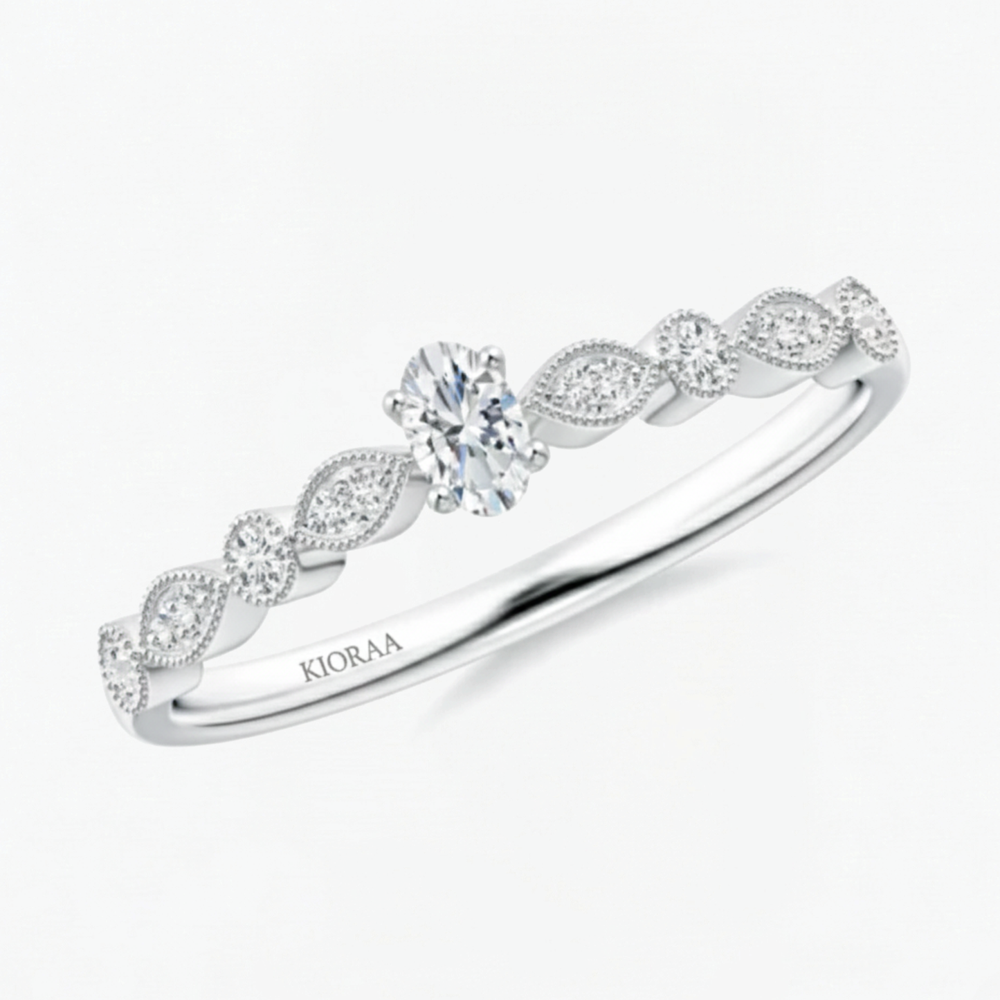 Vintage Halo Oval and Round Engagement Ring