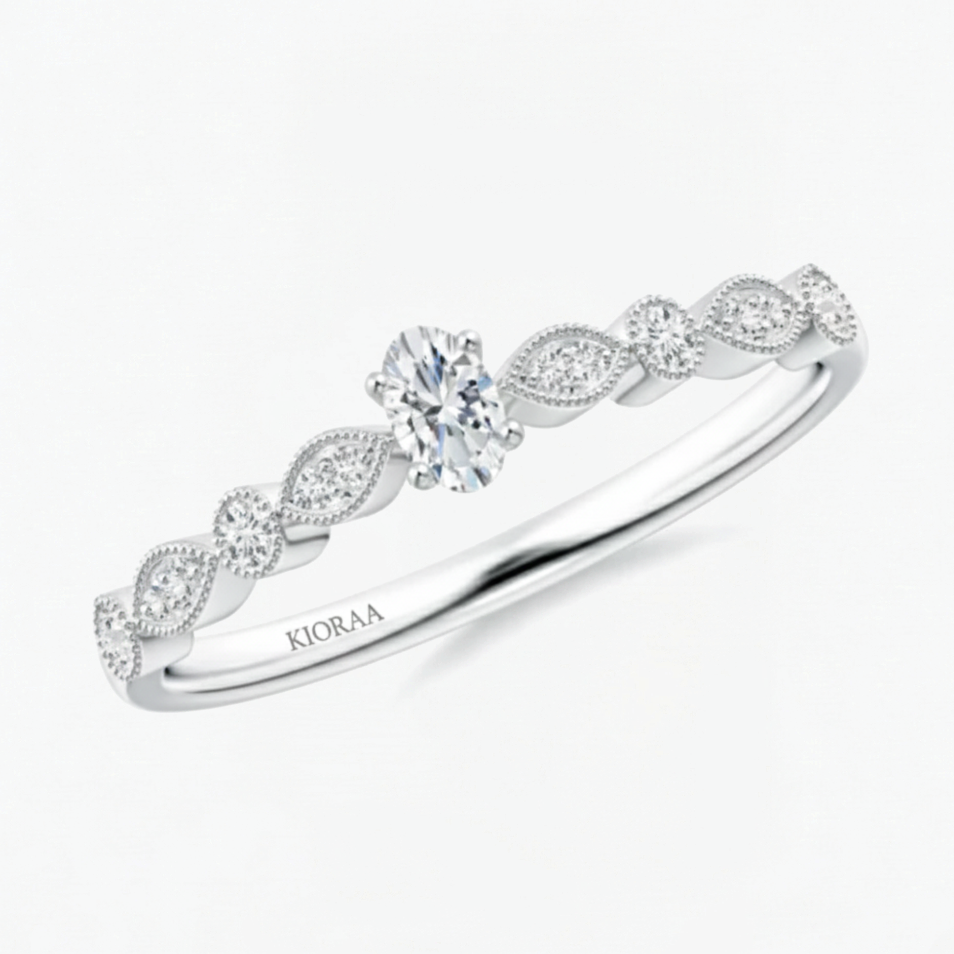Vintage Halo Oval and Round Engagement Ring