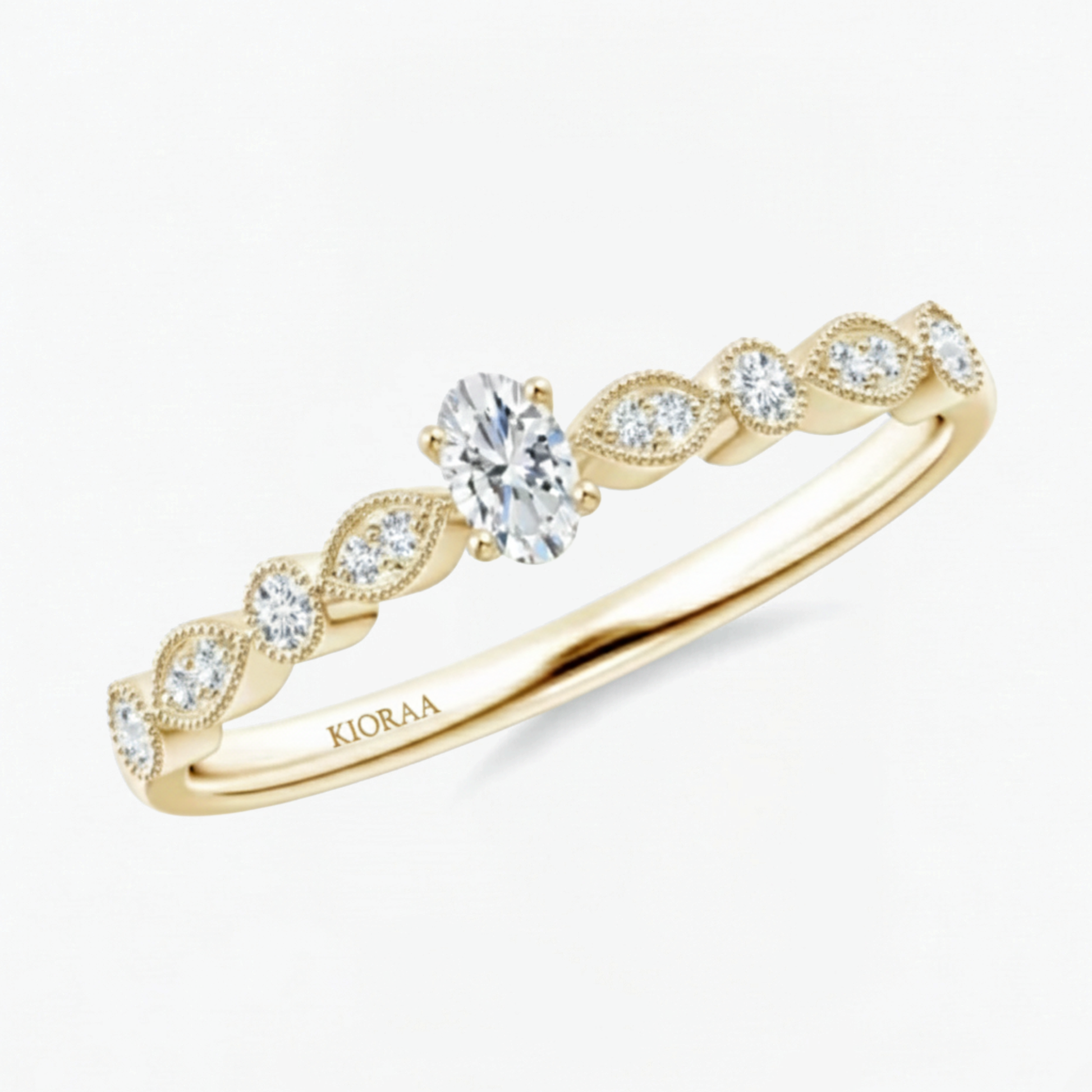Vintage Halo Oval and Round Engagement Ring