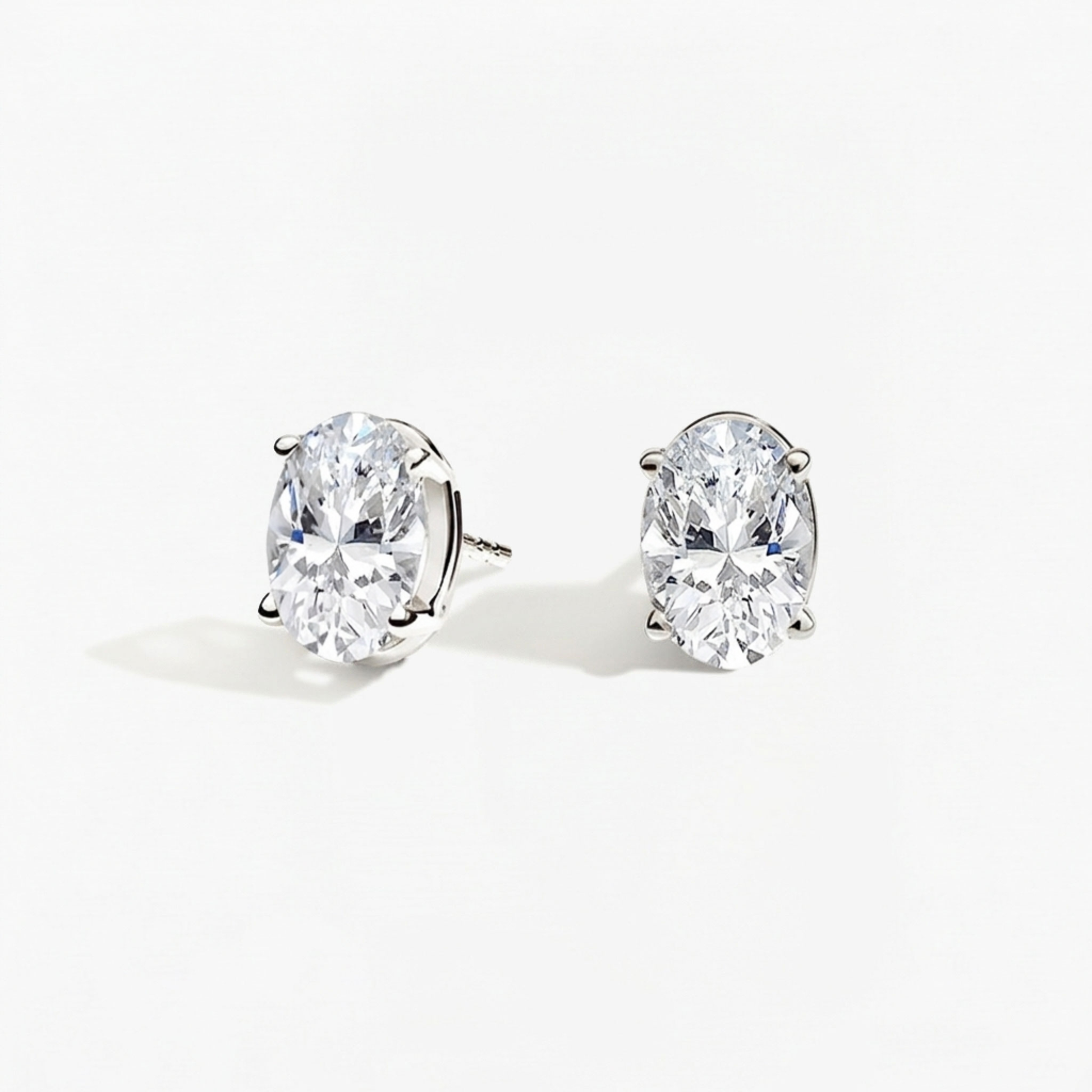 Classic Oval Diamond Solitaire Studs