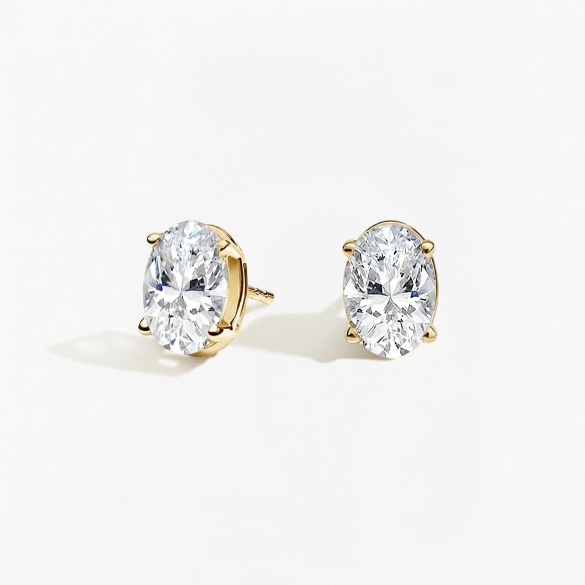 Classic Oval Diamond Solitaire Studs