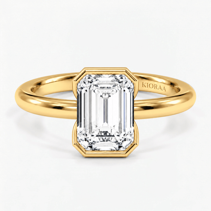 Emerald Half Bezel Solitaire Engagement Ring