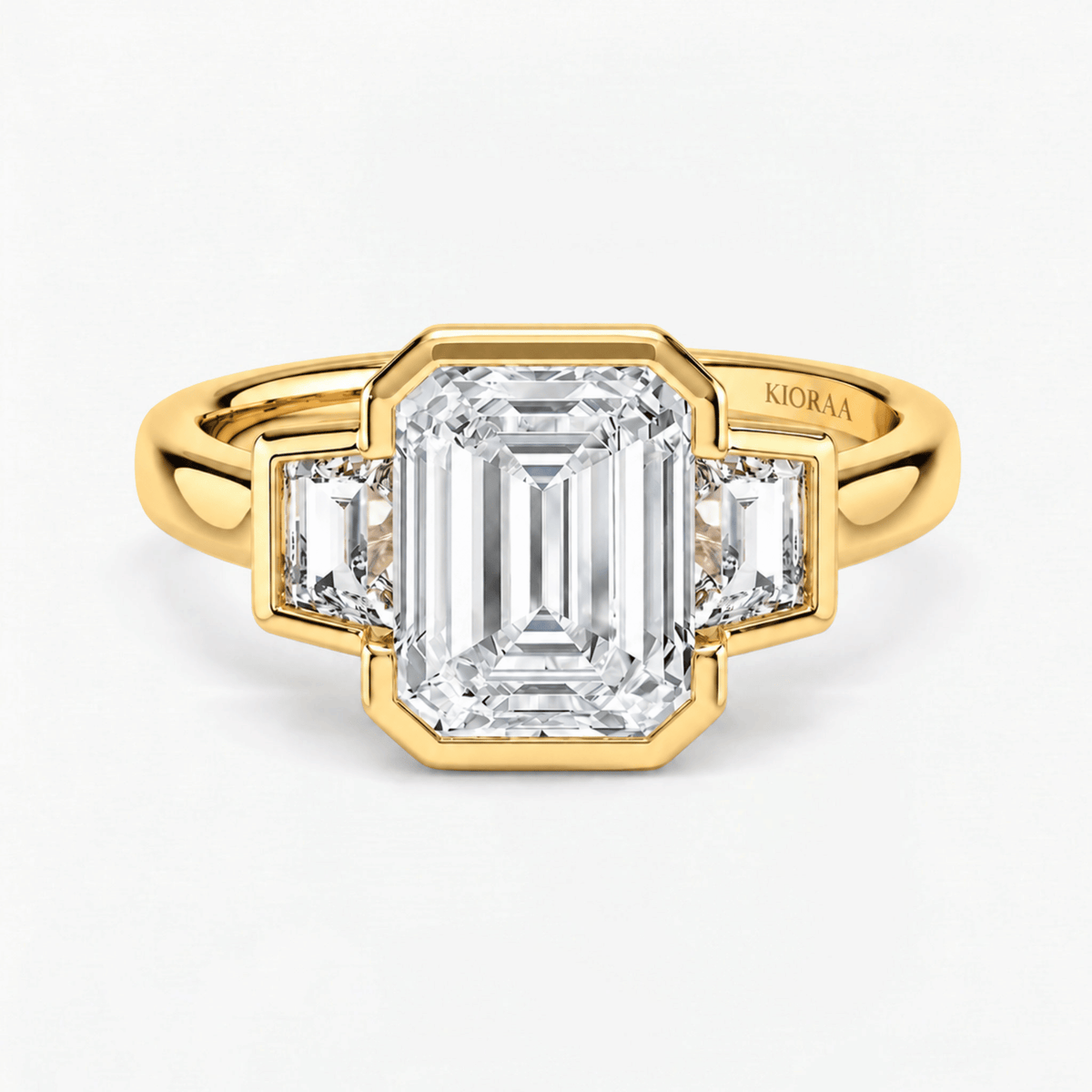 Octavia Emerald Trapezoid Three Stone Ring
