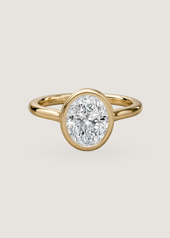 Classic Simple Oval Bezel Solitaire Engagement Ring