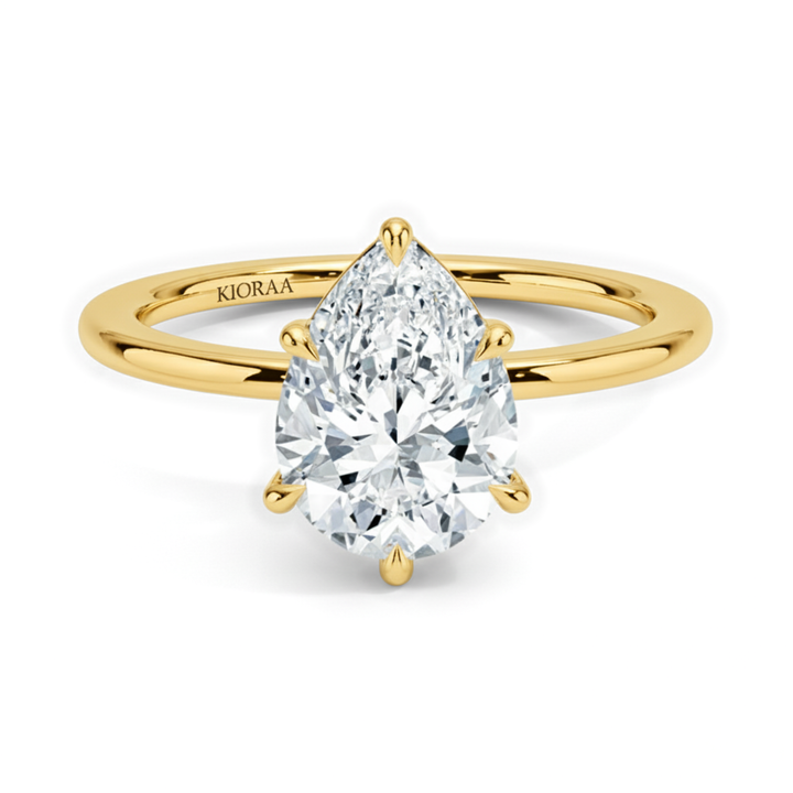 Classic Simple Pear  Solitaire Engagement Ring